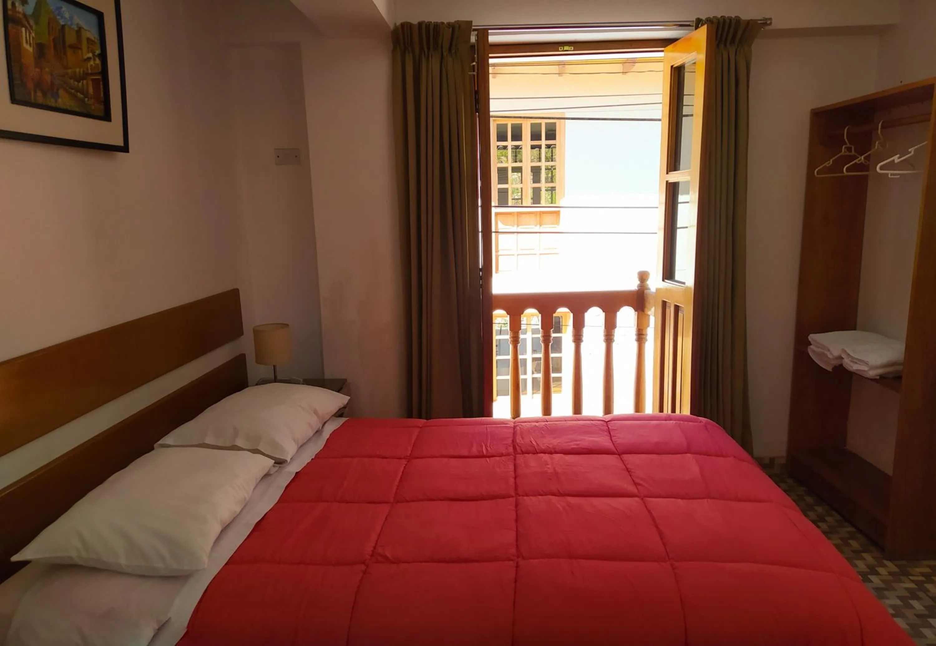 Bed in Tambo de Ollantay Hotel