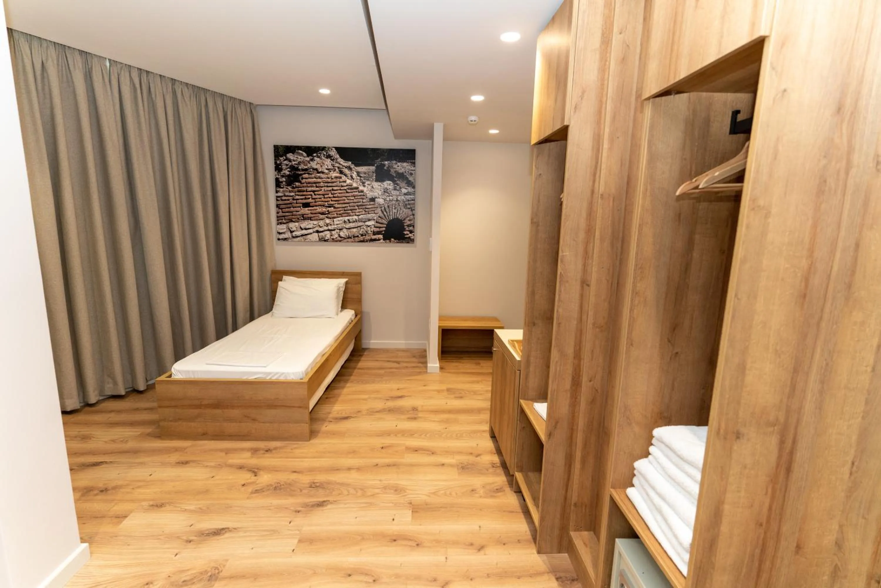 Bed in Titania Hotel