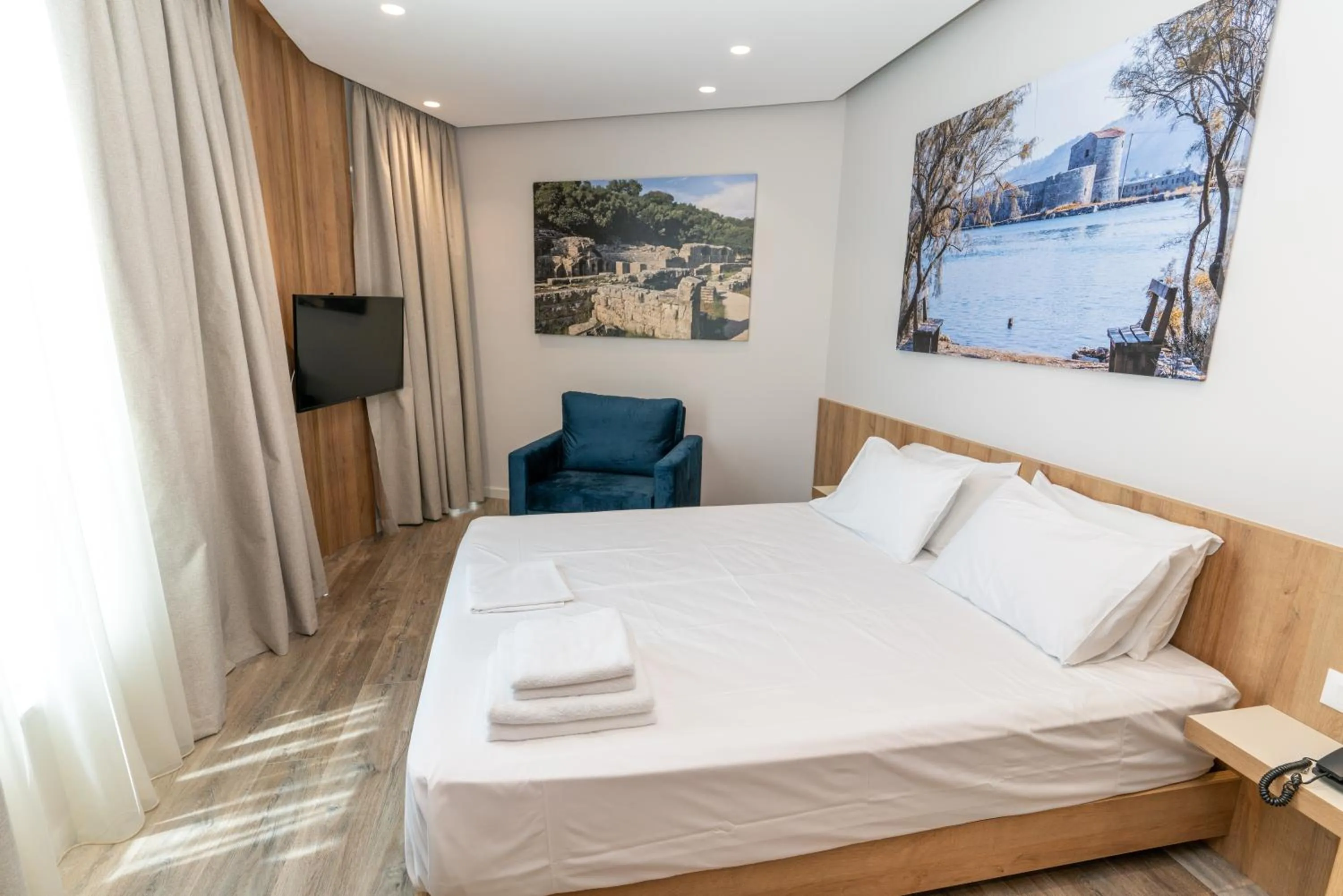 Bed in Titania Hotel