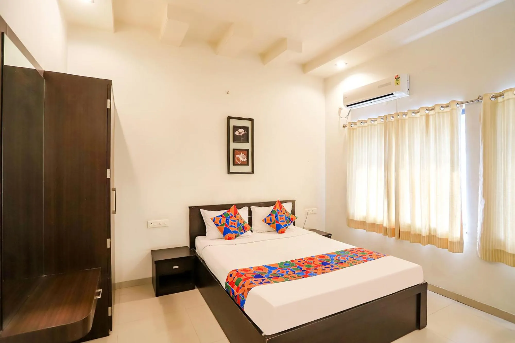 Bed in FabHotel Archanil Apartment - Sitanagar Cricket Ground