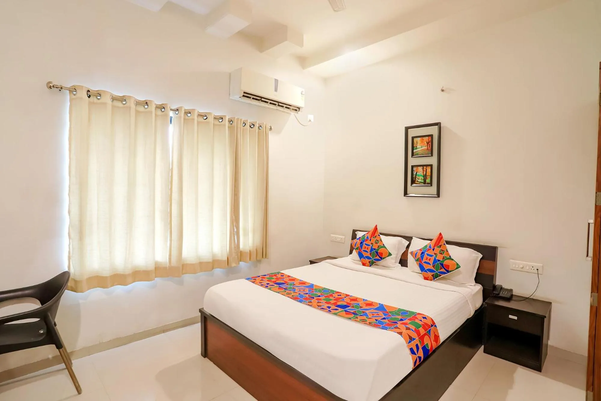 Bed in FabHotel Archanil Apartment - Sitanagar Cricket Ground