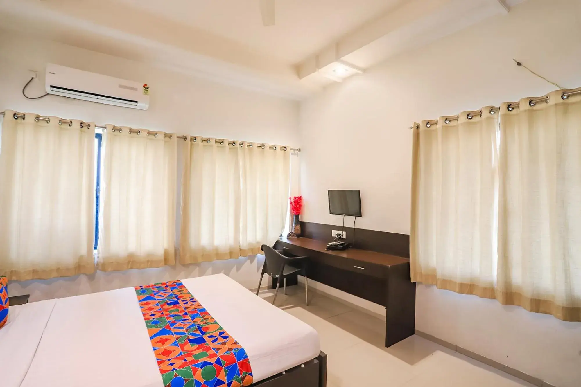 Bed in FabHotel Archanil Apartment - Sitanagar Cricket Ground Bed in FabHotel Archanil Apartment - Sitanagar Cricket Ground