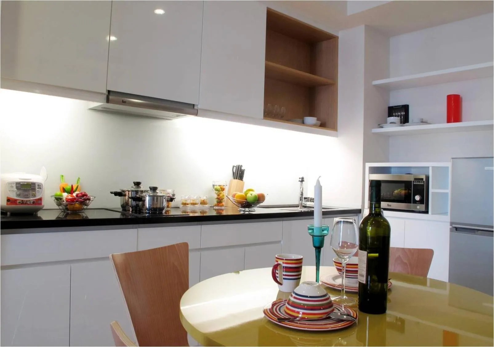 Kitchen or kitchenette in Bluesky Serviced Apartment Airport Plaza