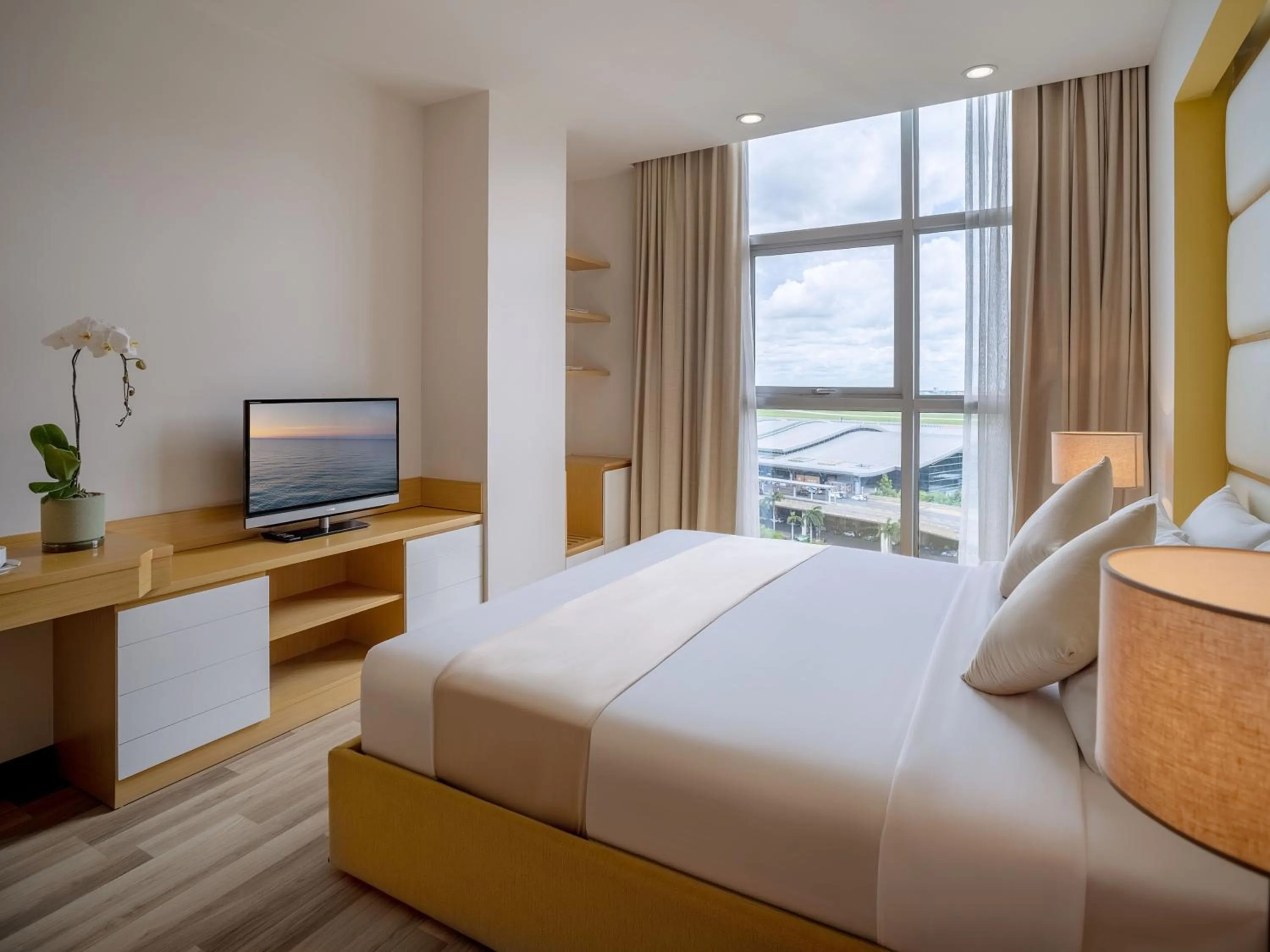 Bed in Bluesky Serviced Apartment Airport Plaza