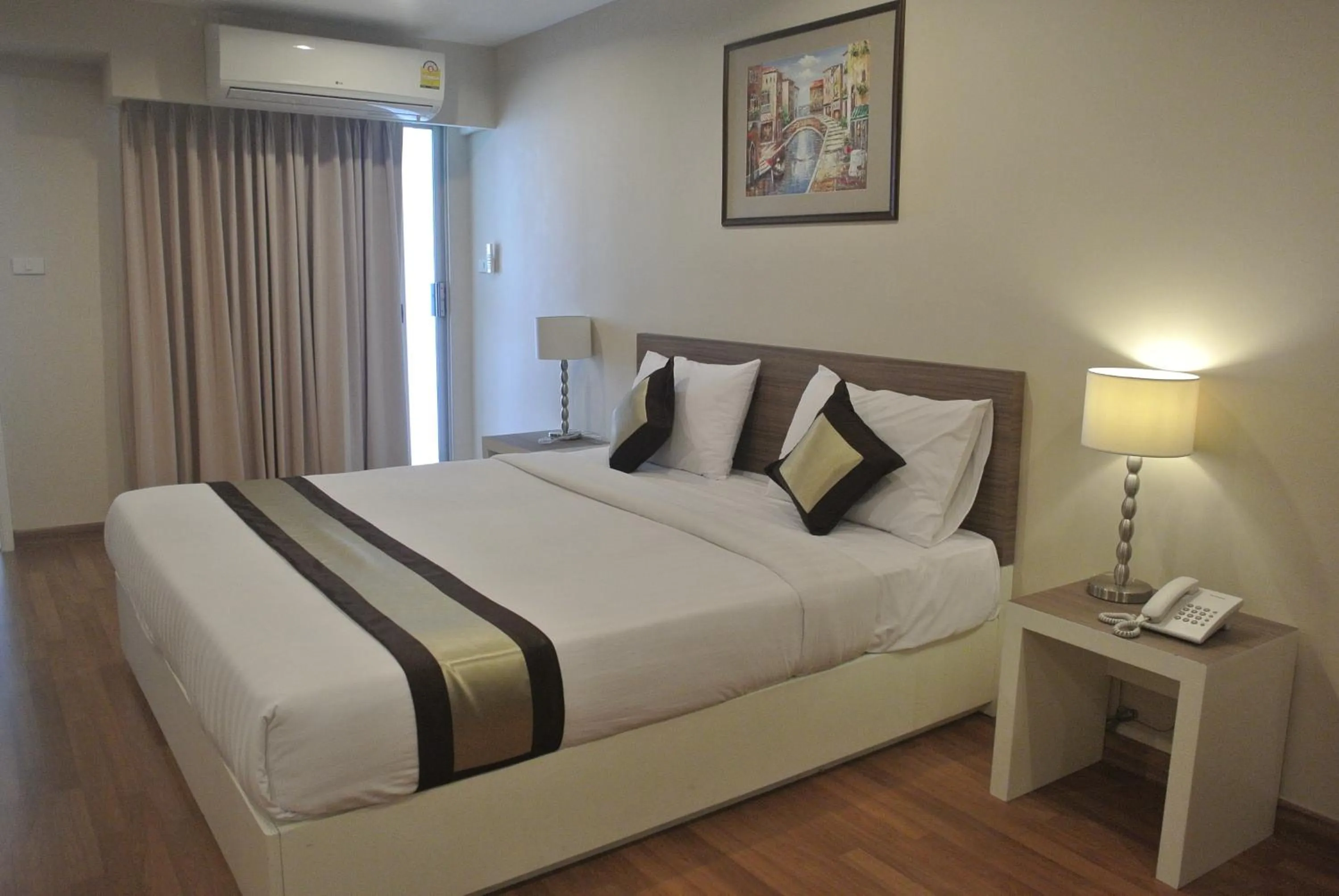 Photo of the whole room, Bed in Nanatai Suites