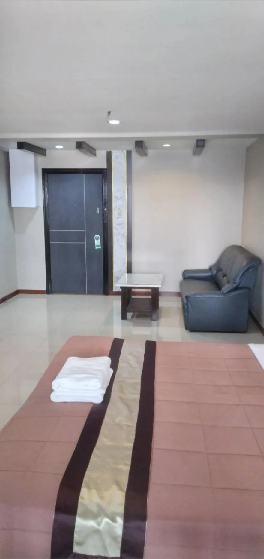 Photo of the whole room, Bed in Nanatai Suites