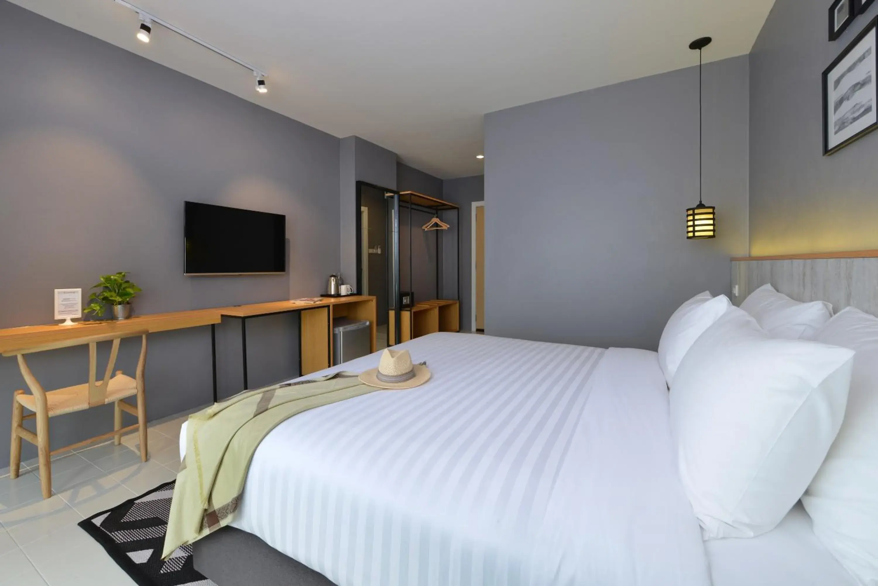 Photo of the whole room, Bed in Ruenthip Pattaya Photo of the whole room, Bed in Ruenthip Pattaya