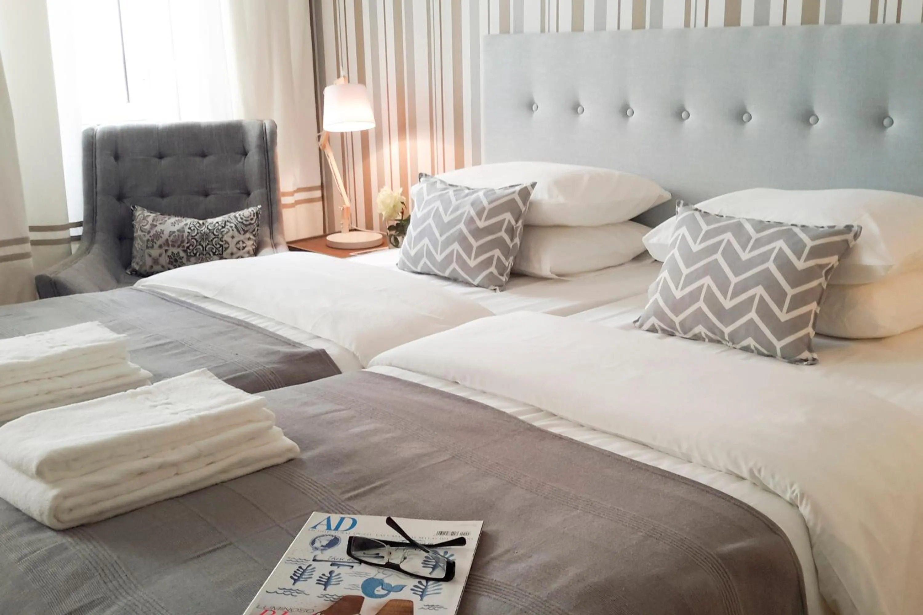 Bed in Flores Guest House