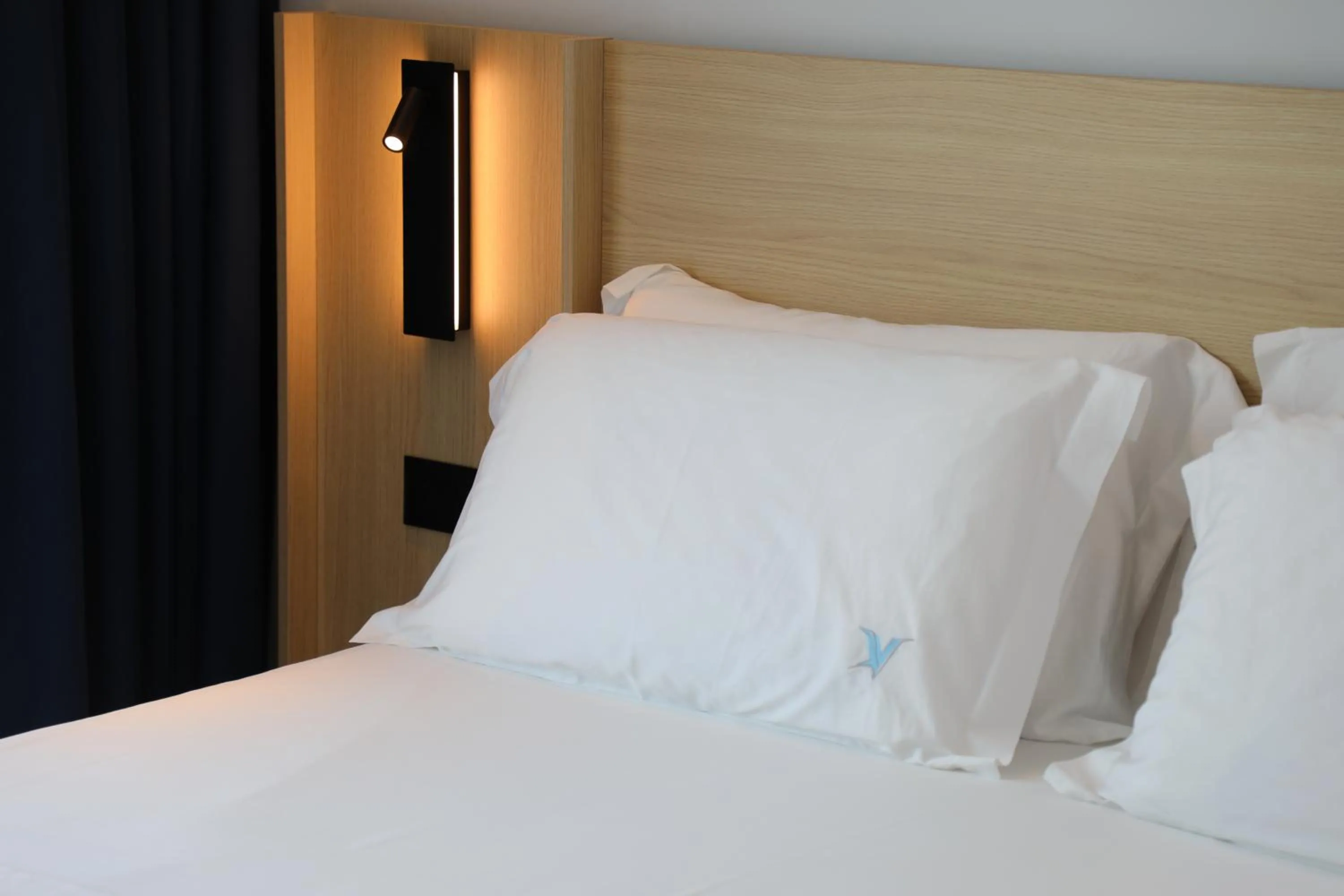 Bed in Victoria Boutique Hotel