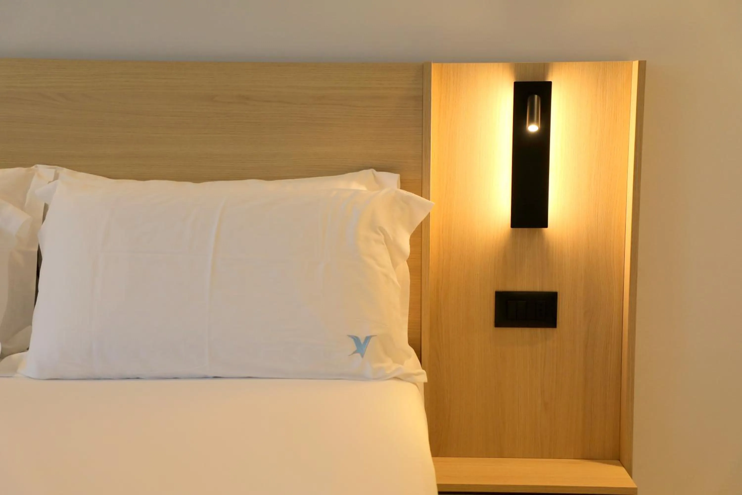 Bed in Victoria Boutique Hotel