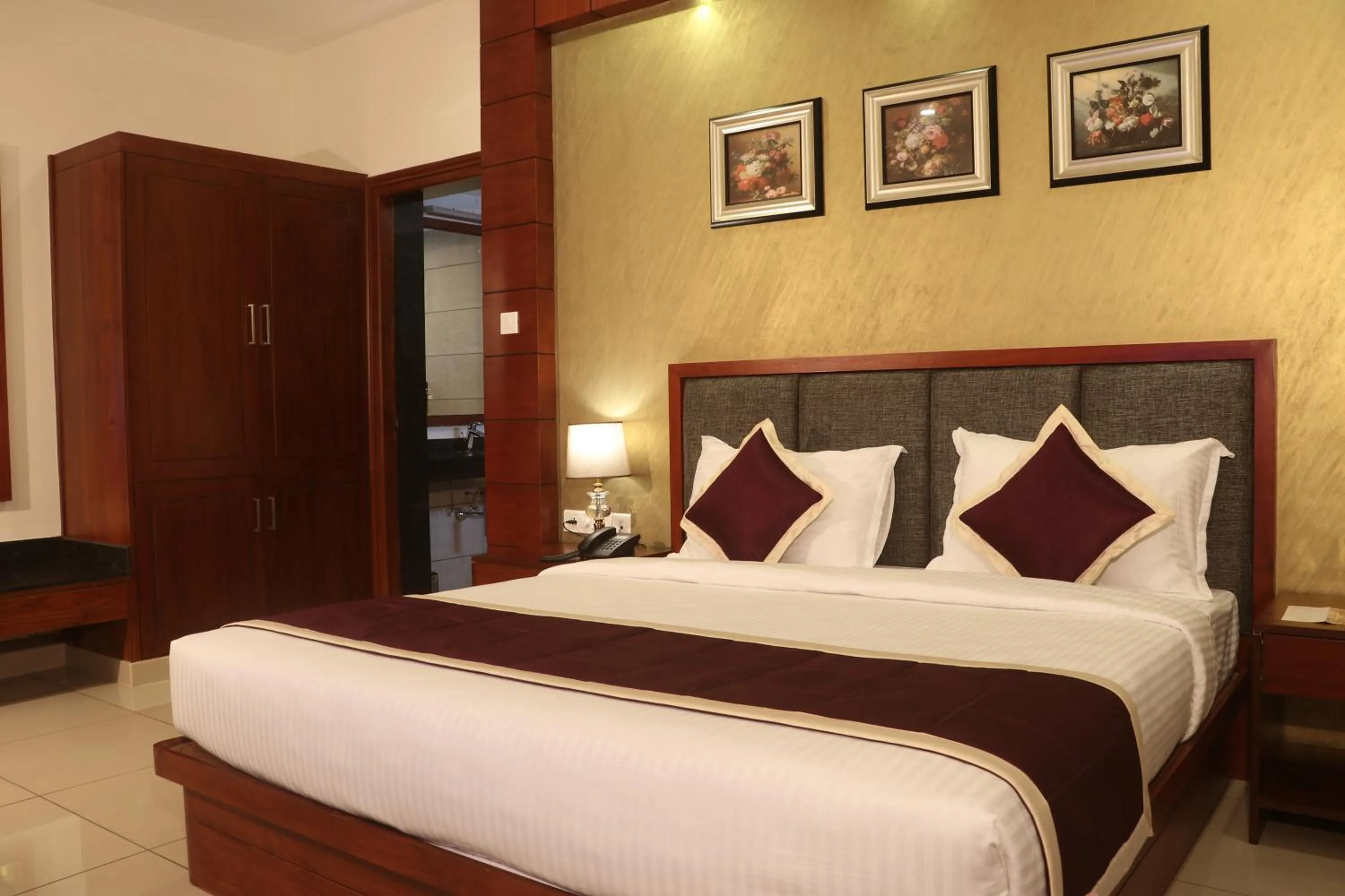 Bed in Bhasuri Inn Guruvayoor