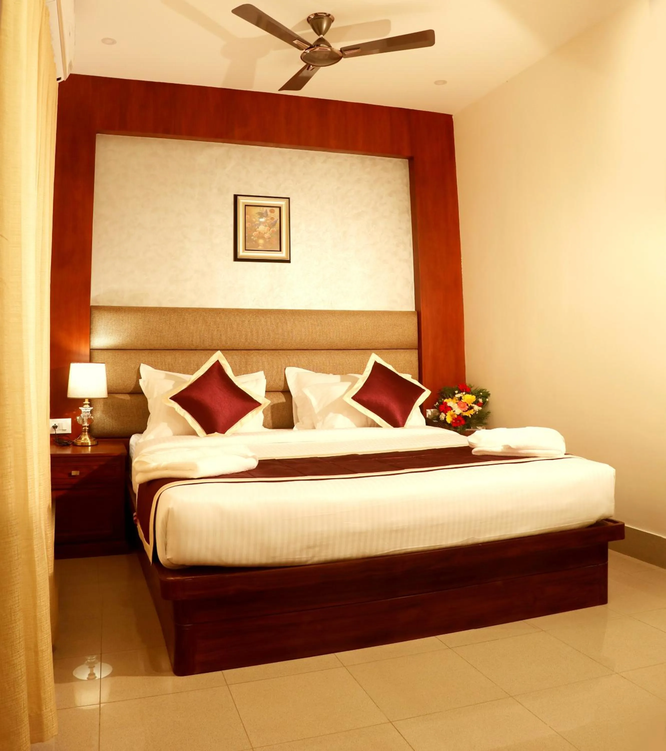 Bed in Bhasuri Inn Guruvayoor