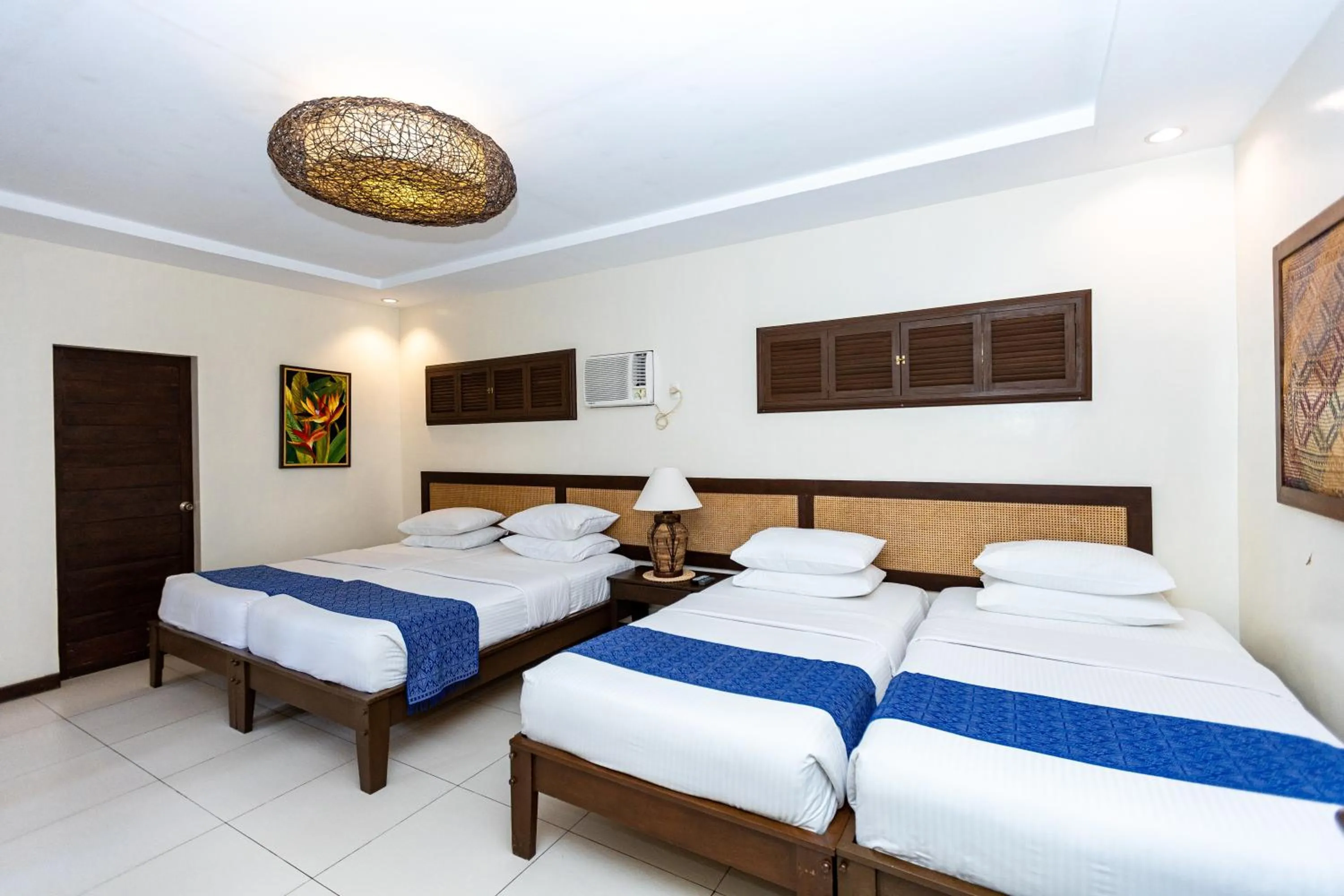 Bed in Azure Dive Resort