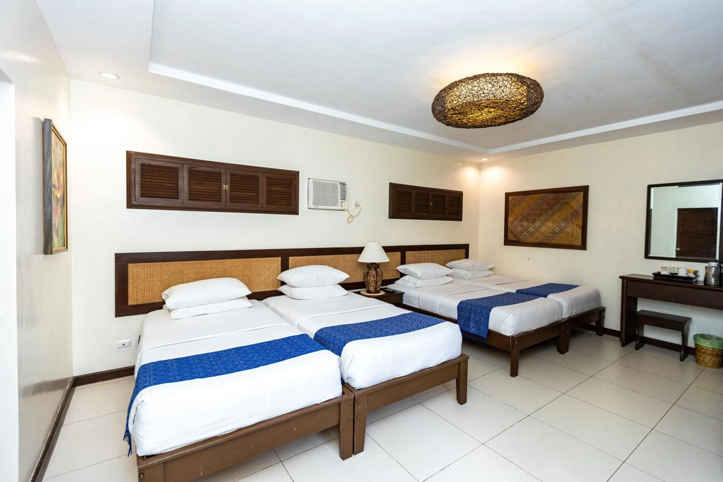 Bed in Azure Dive Resort