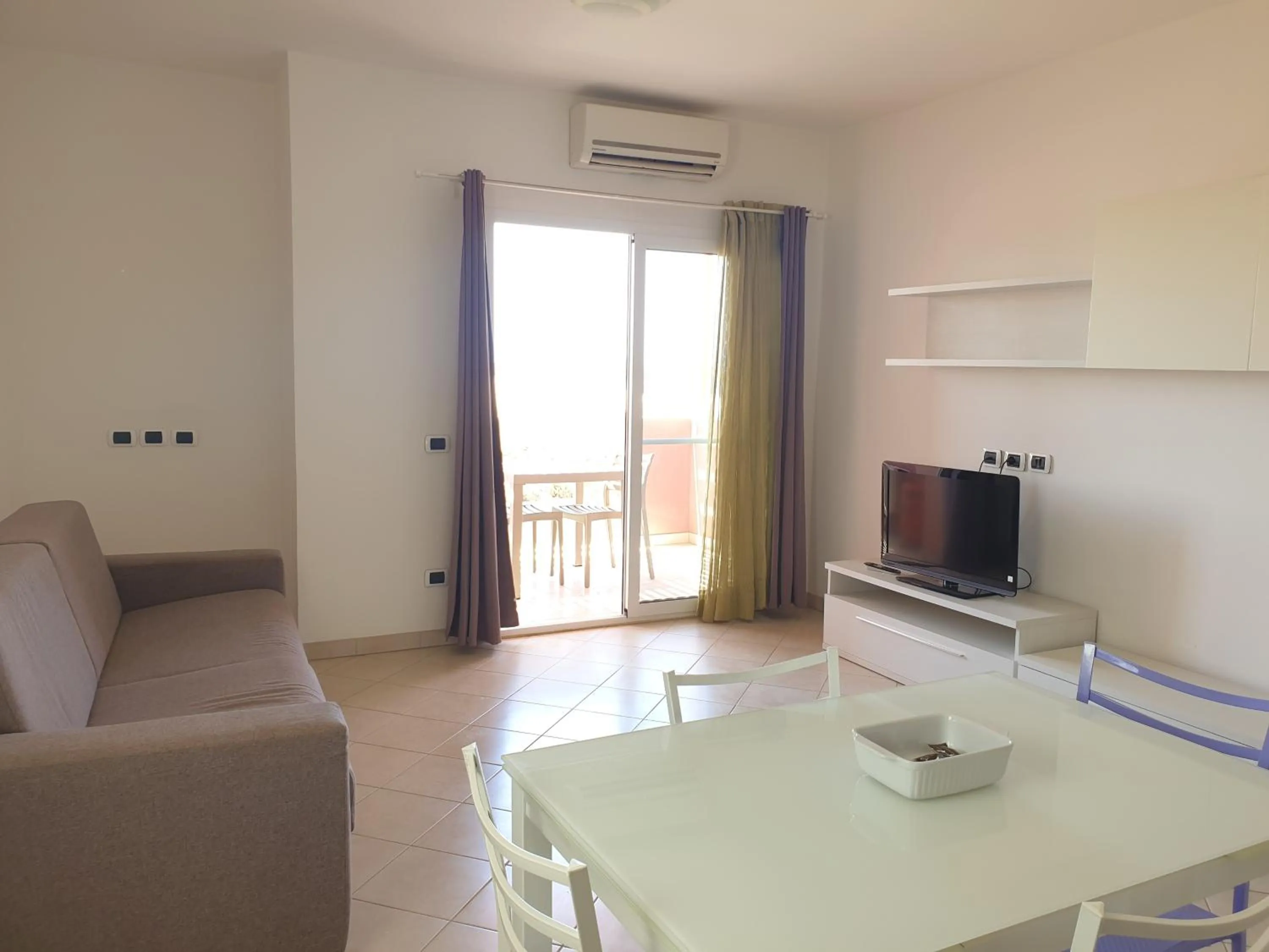 Living room in Aparthotel Por do Sol