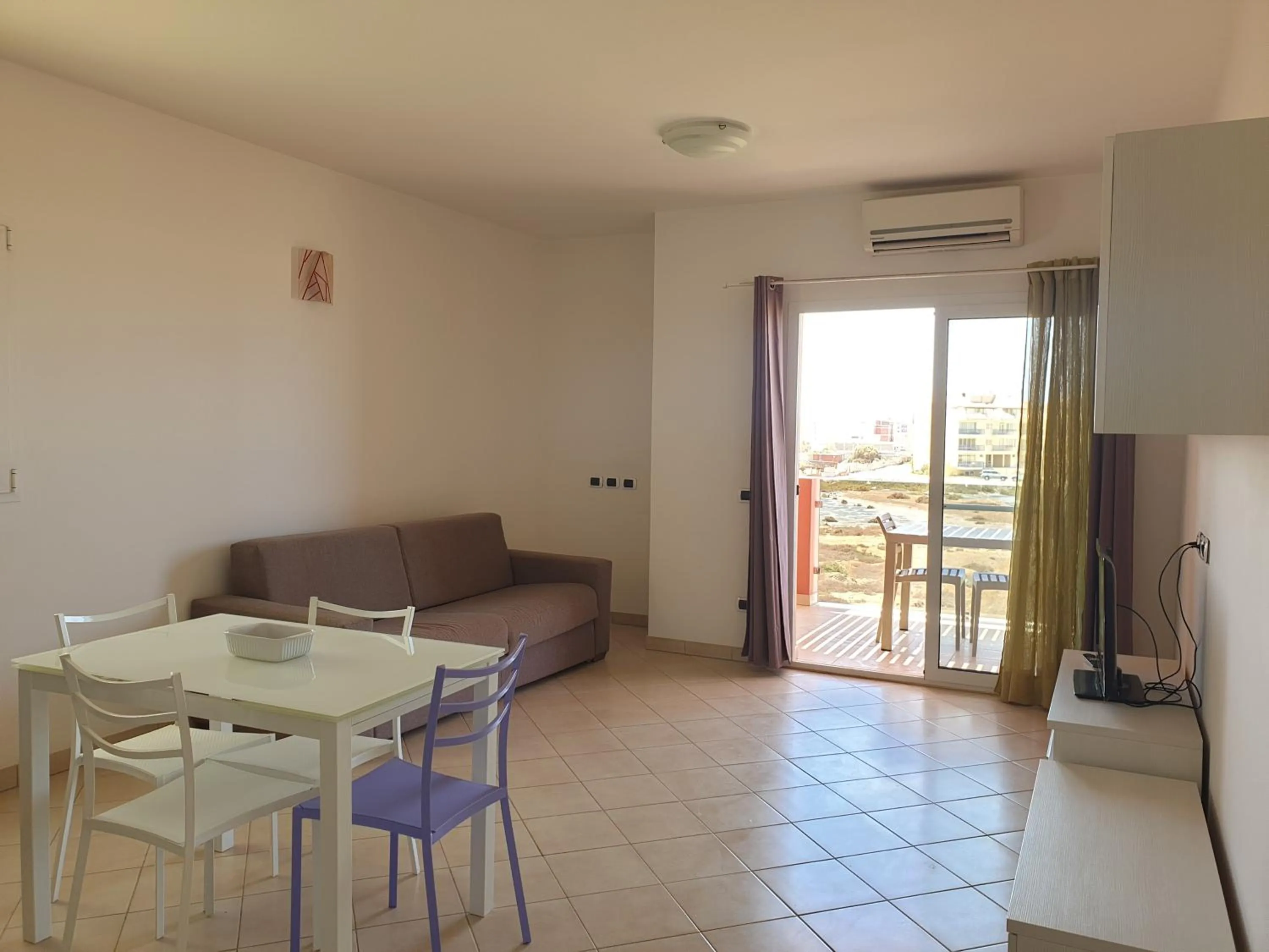 Living room in Aparthotel Por do Sol