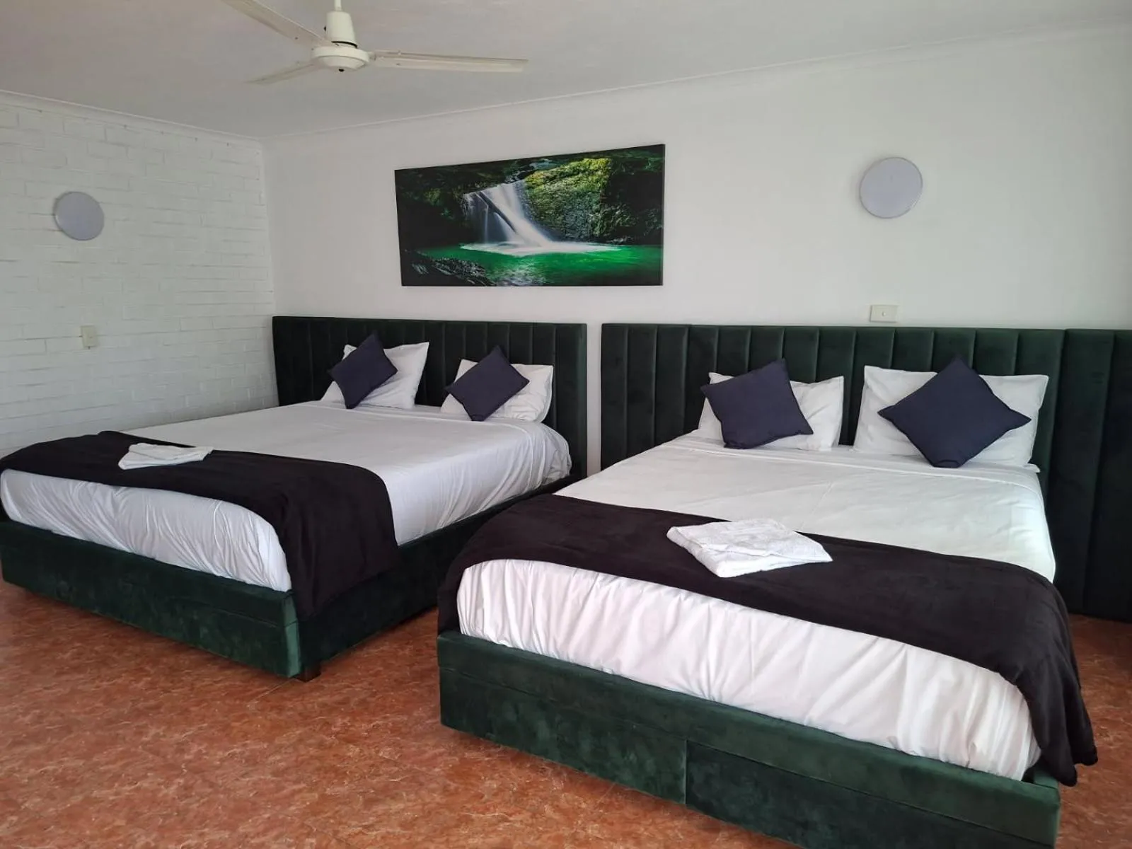Bed in The Queenslander Motel