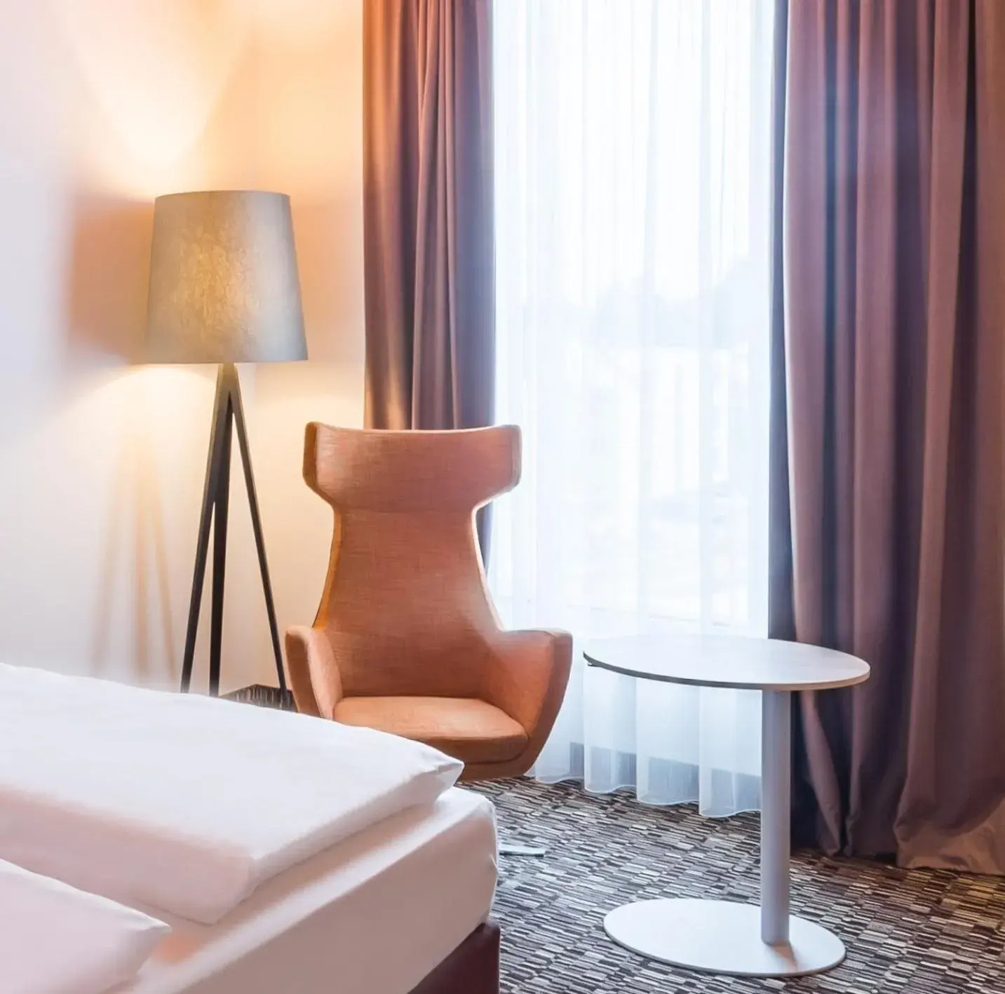 Seating area, Bed in Park Inn by Radisson Neumarkt Seating area, Bed in Park Inn by Radisson Neumarkt