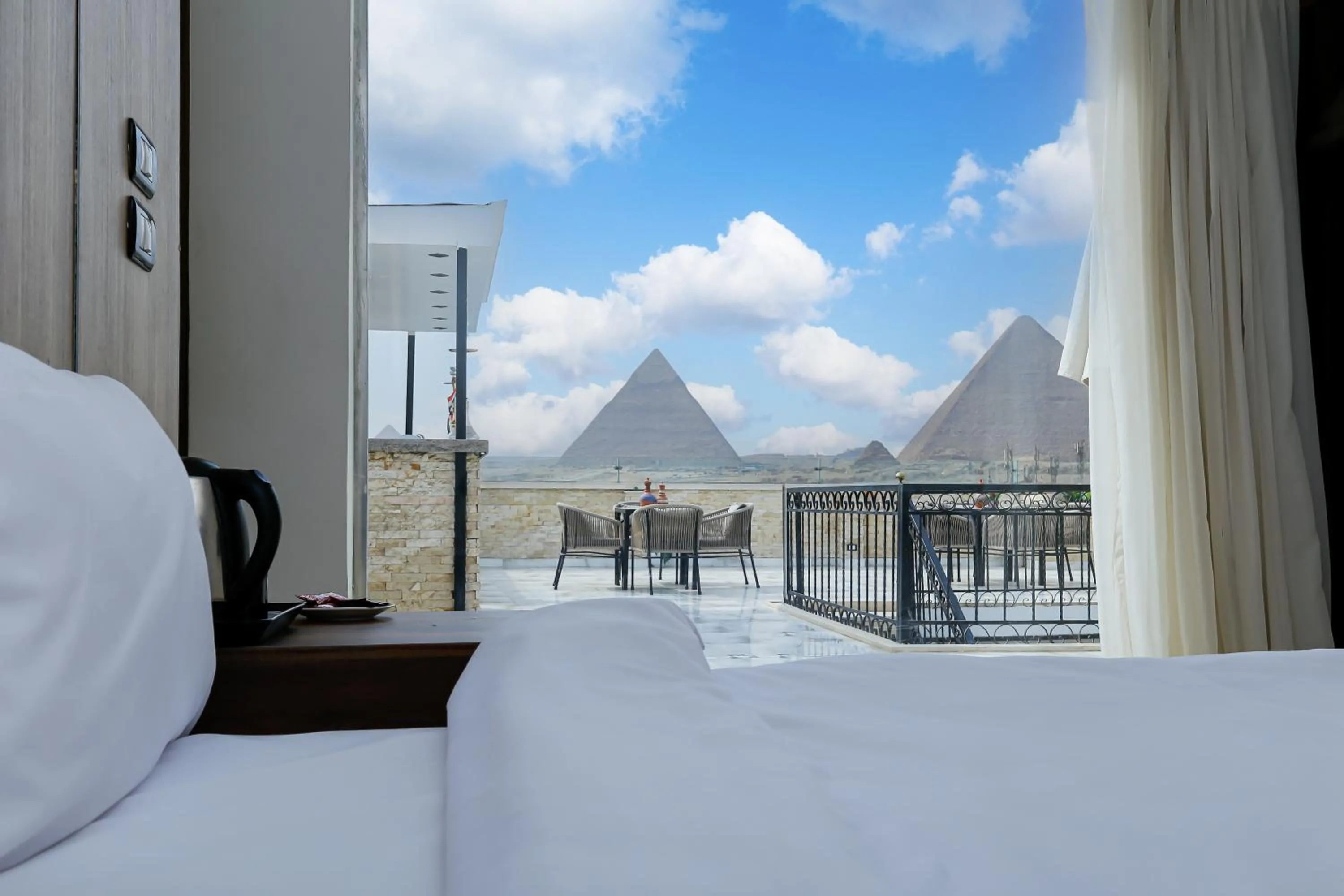 View (from property/room), Bed in Point Pyramids View