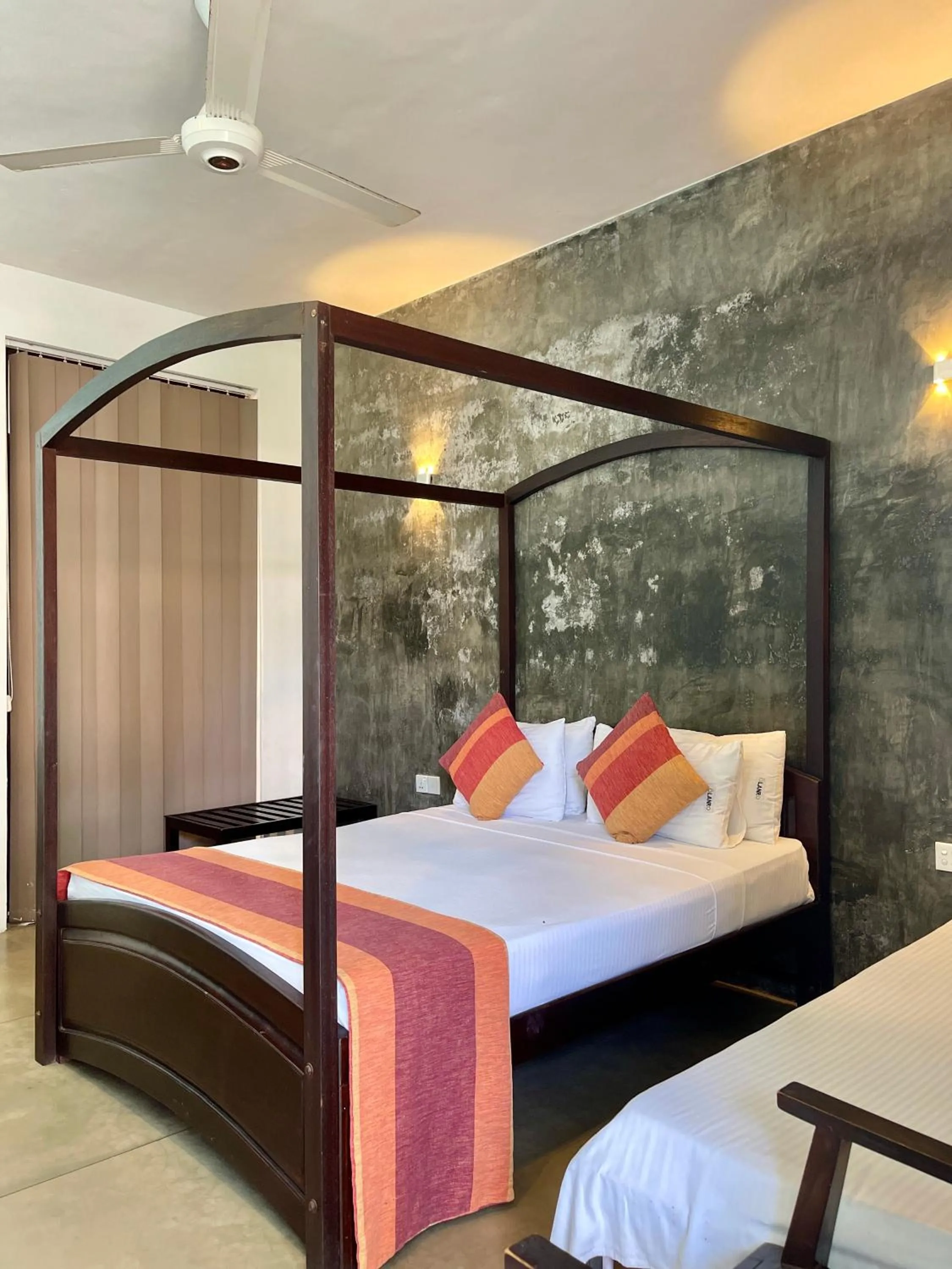 Bed in Olanro Hotel Negombo