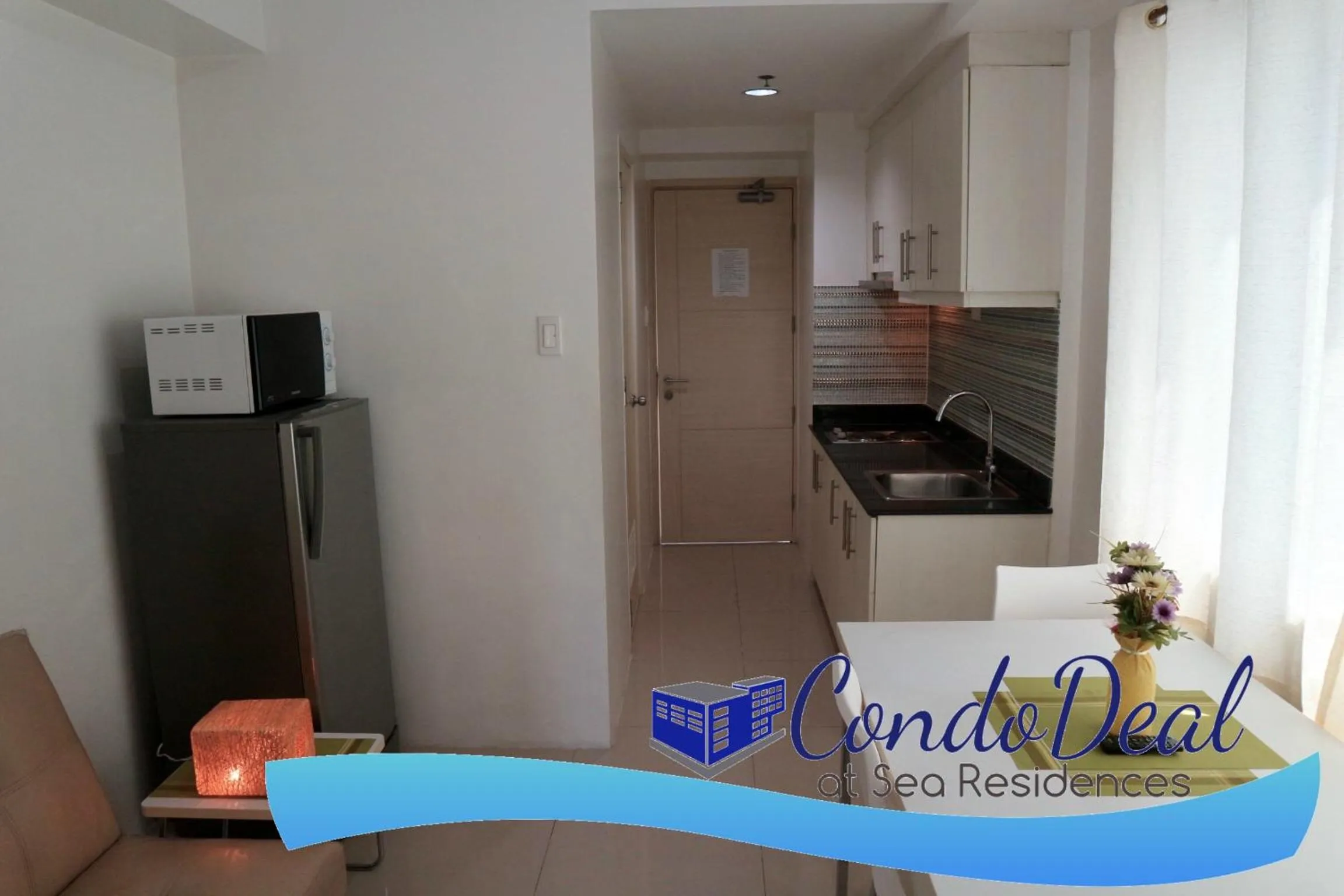 Dining area in CondoDeal at Sea Residences