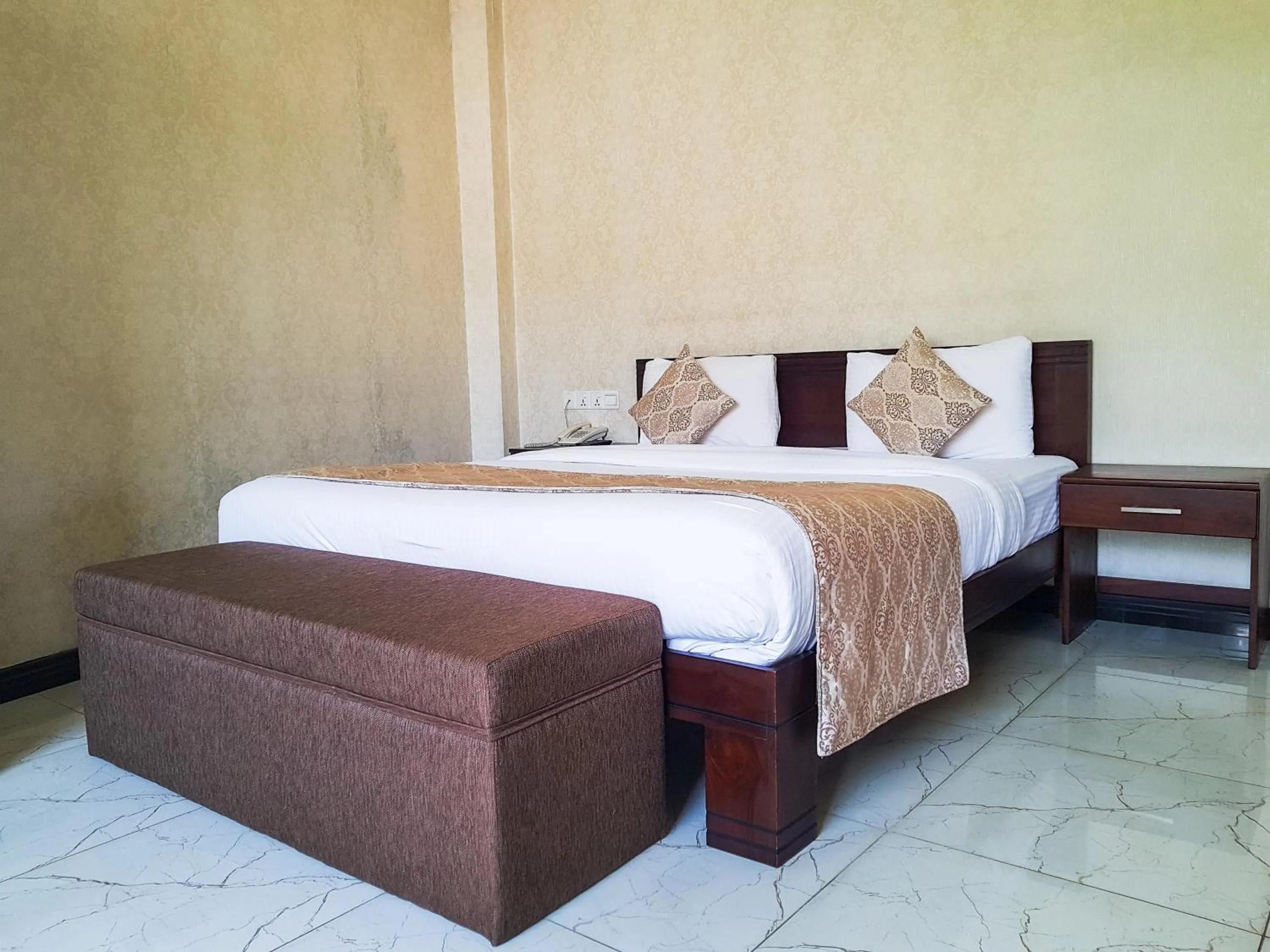 Bed in Galaxy City Hotel