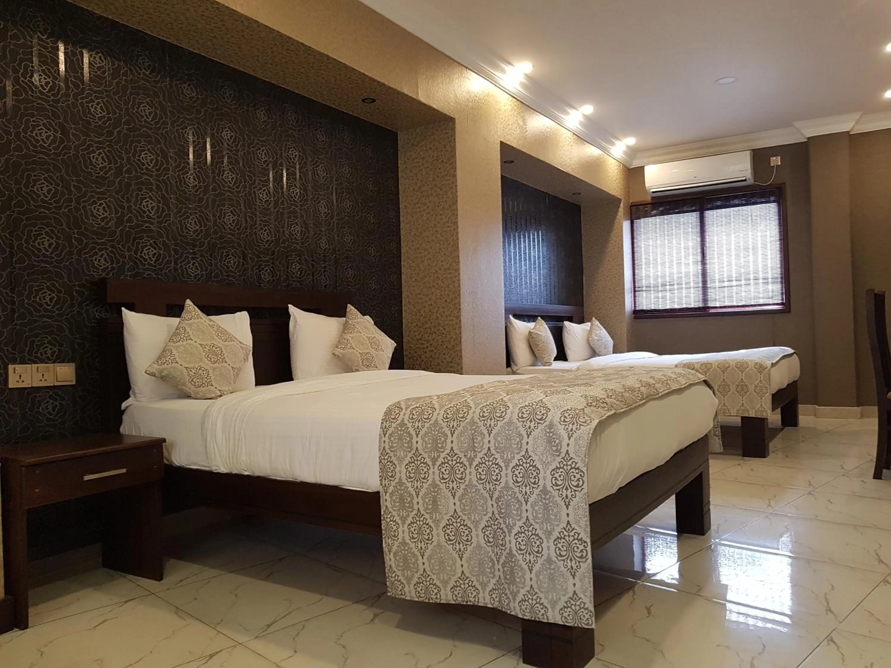 Bed in Galaxy City Hotel