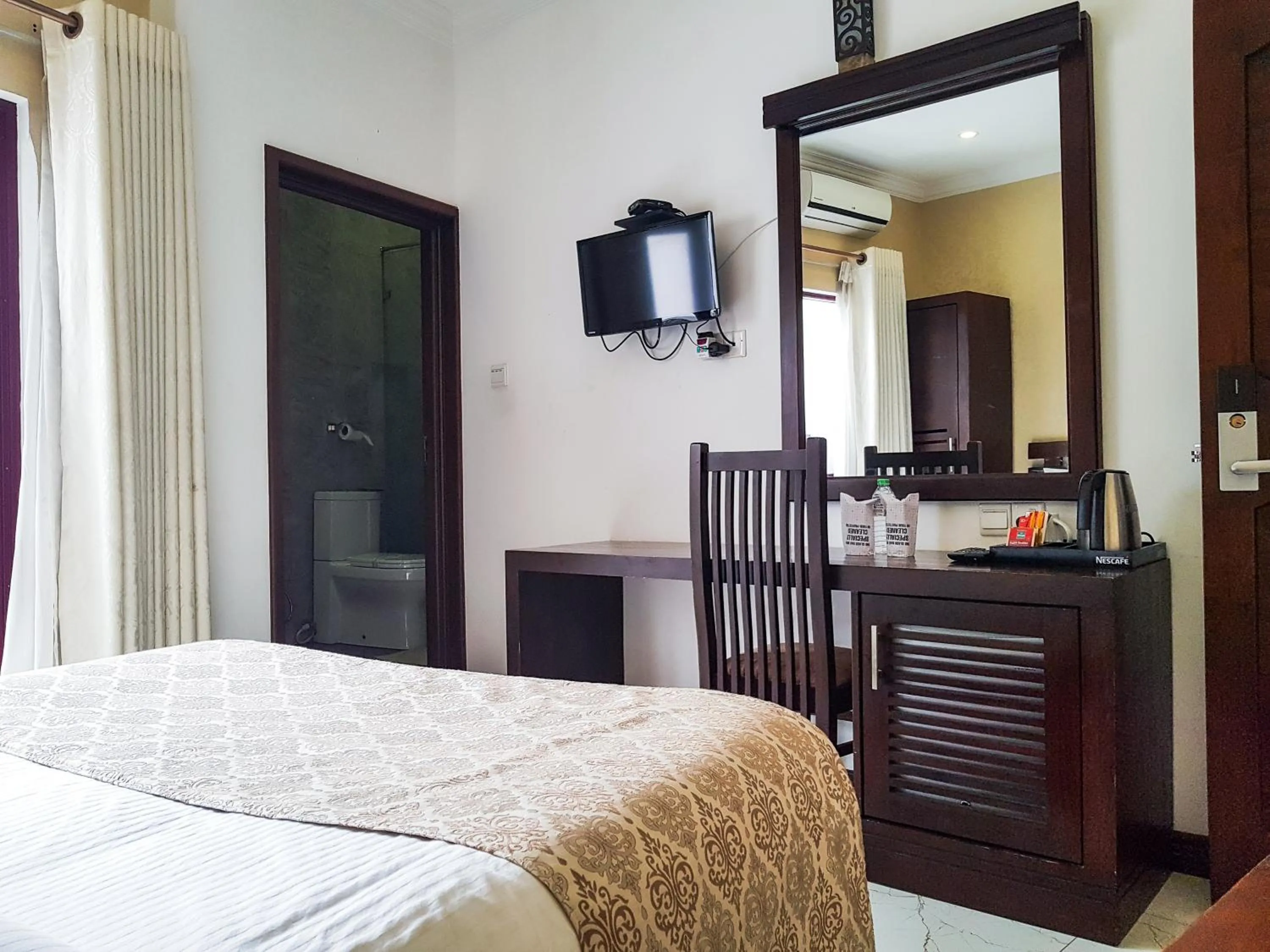 Bed in Galaxy City Hotel