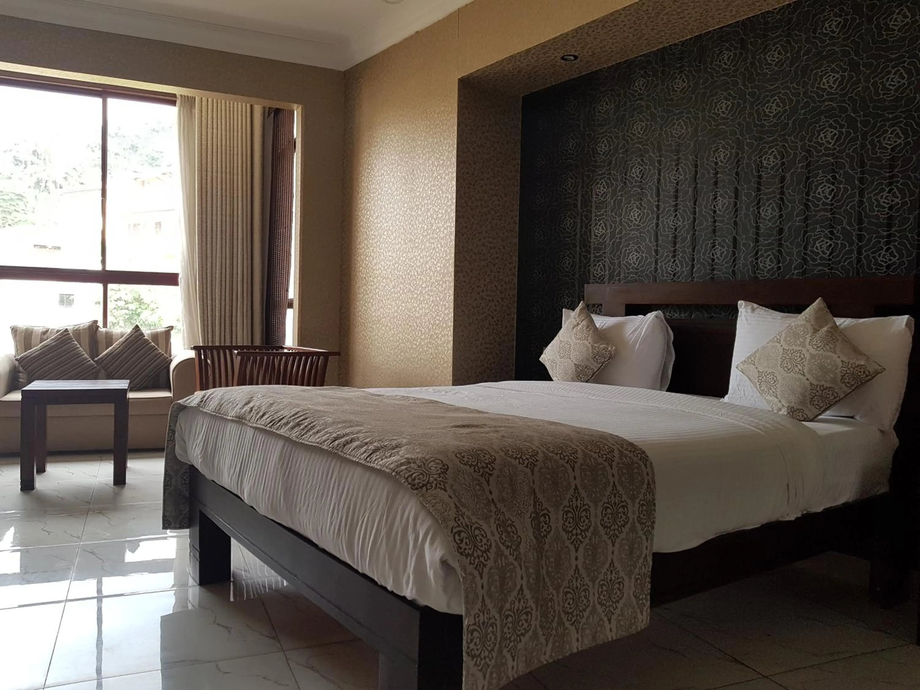 Bed in Galaxy City Hotel