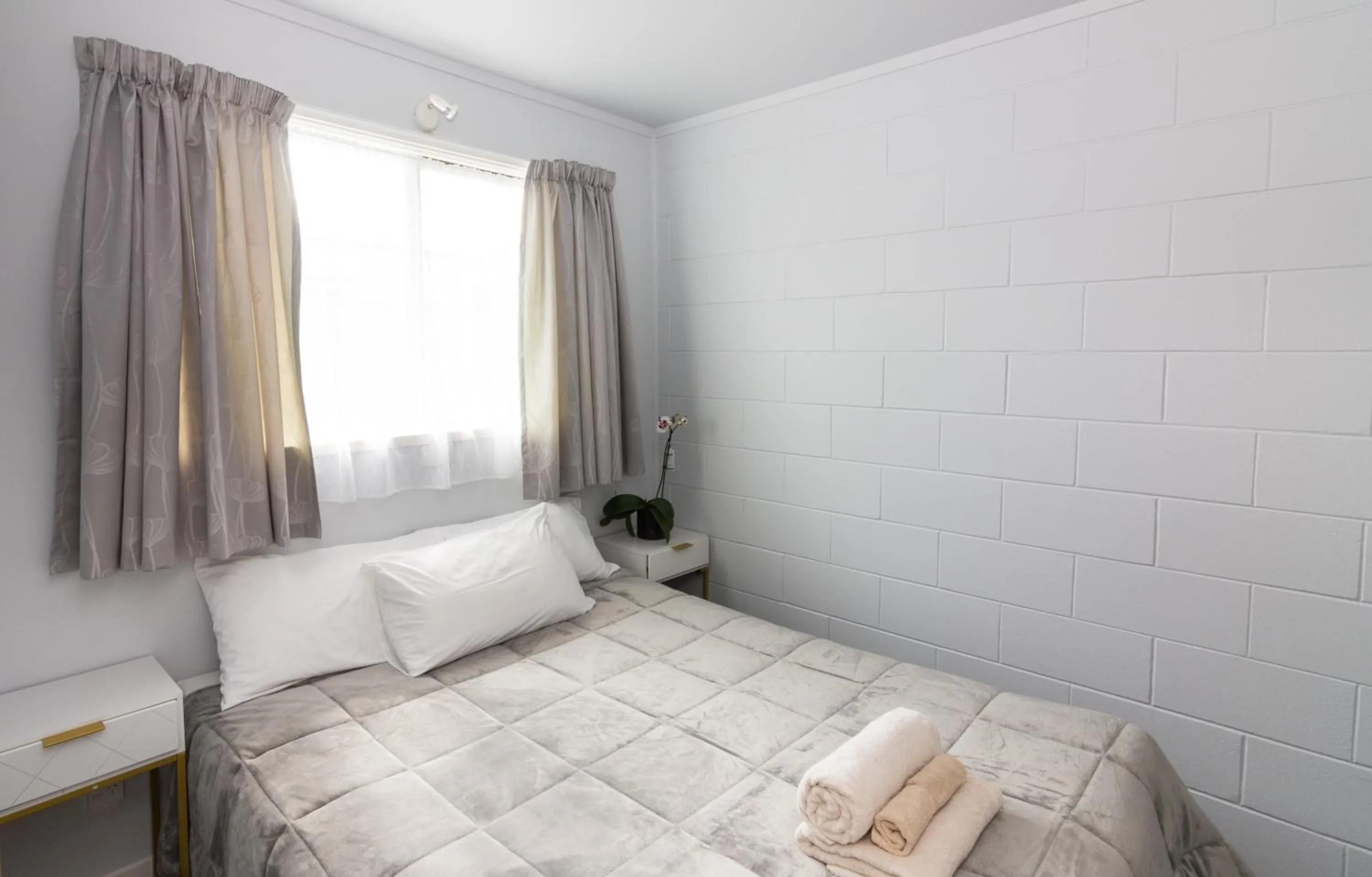 Bed in Kaitaia Motor Lodge