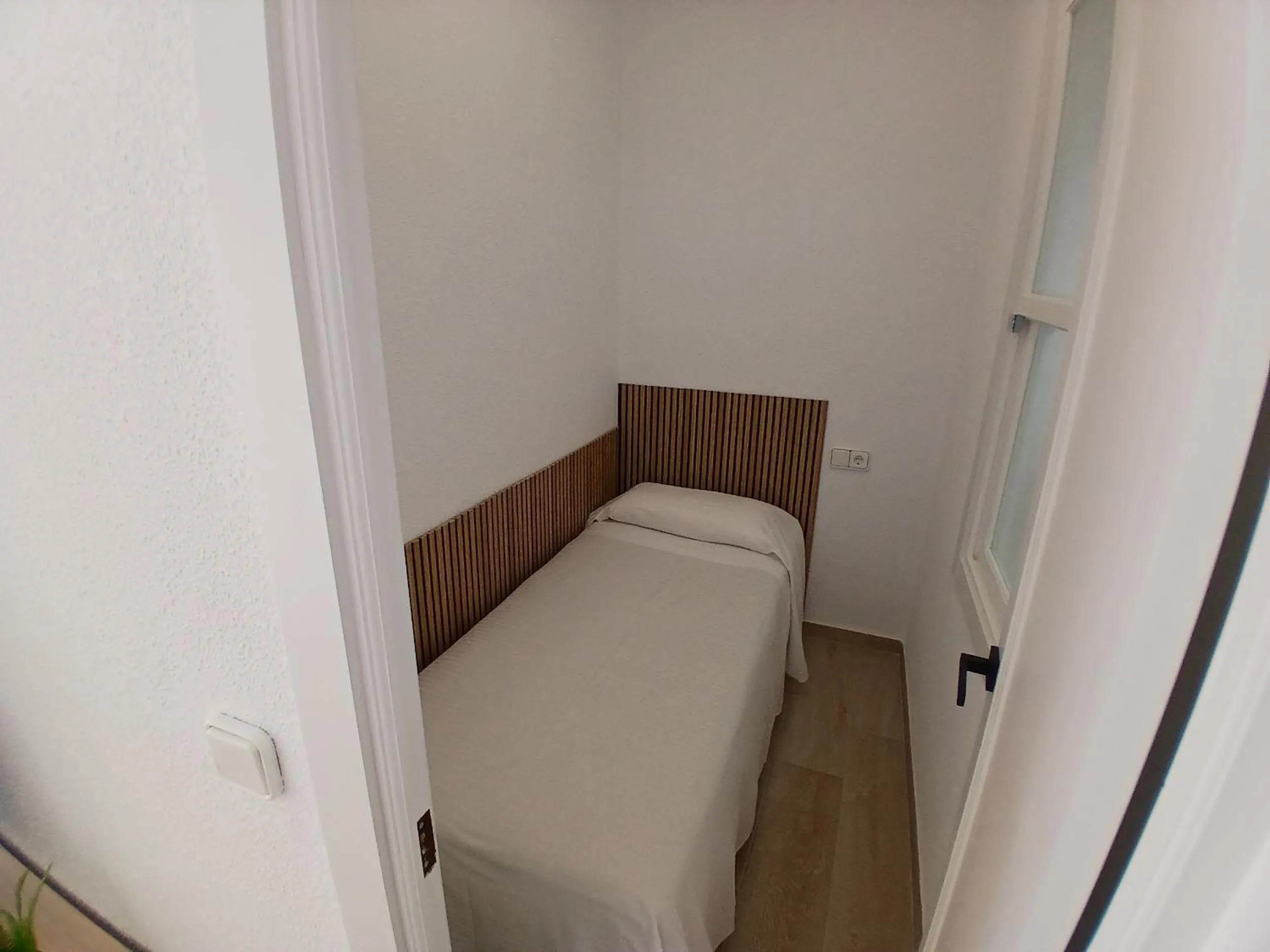 Bed in Apartamentos Benidorm Chorrol