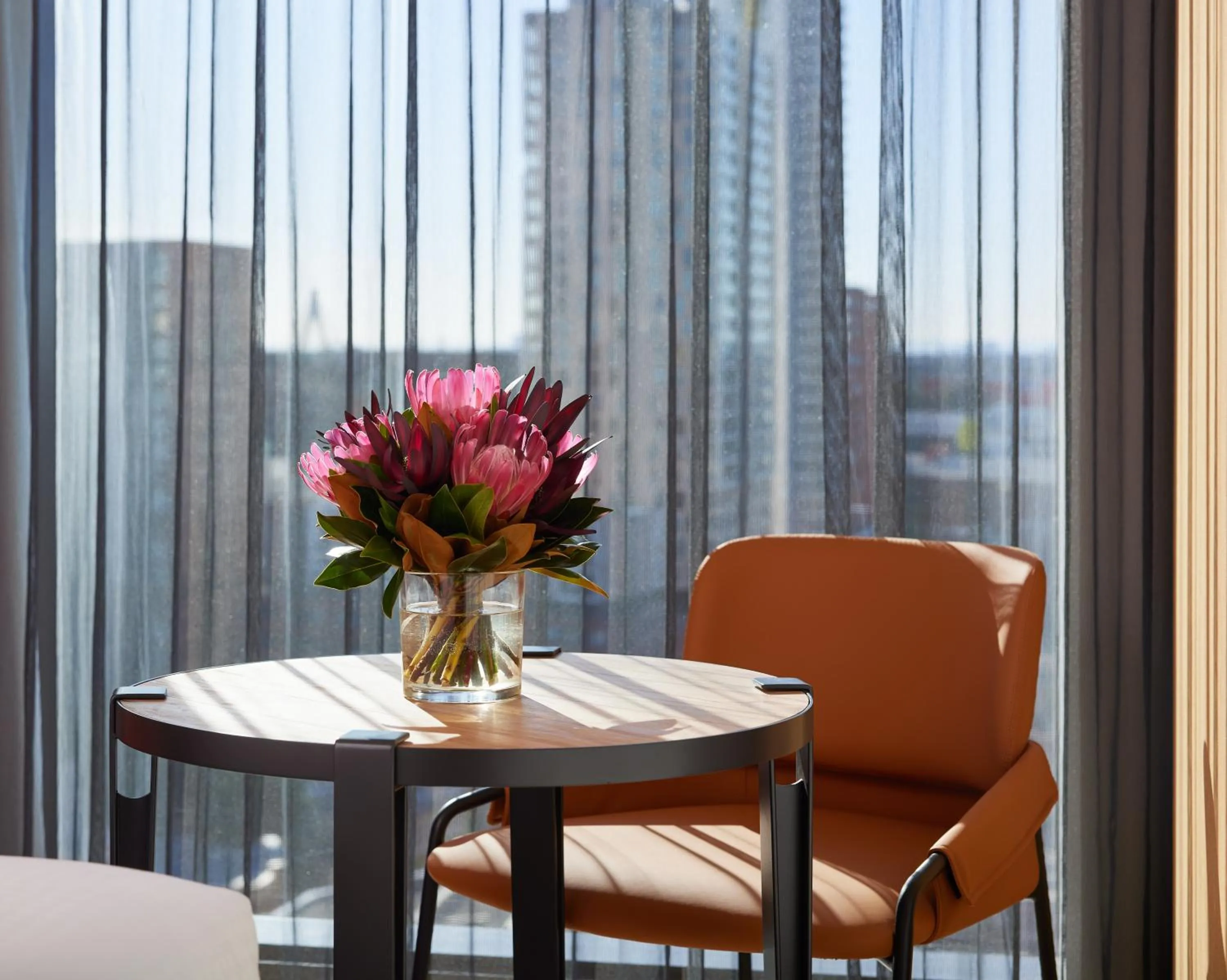 Seating area in Caption By Hyatt Central Sydney