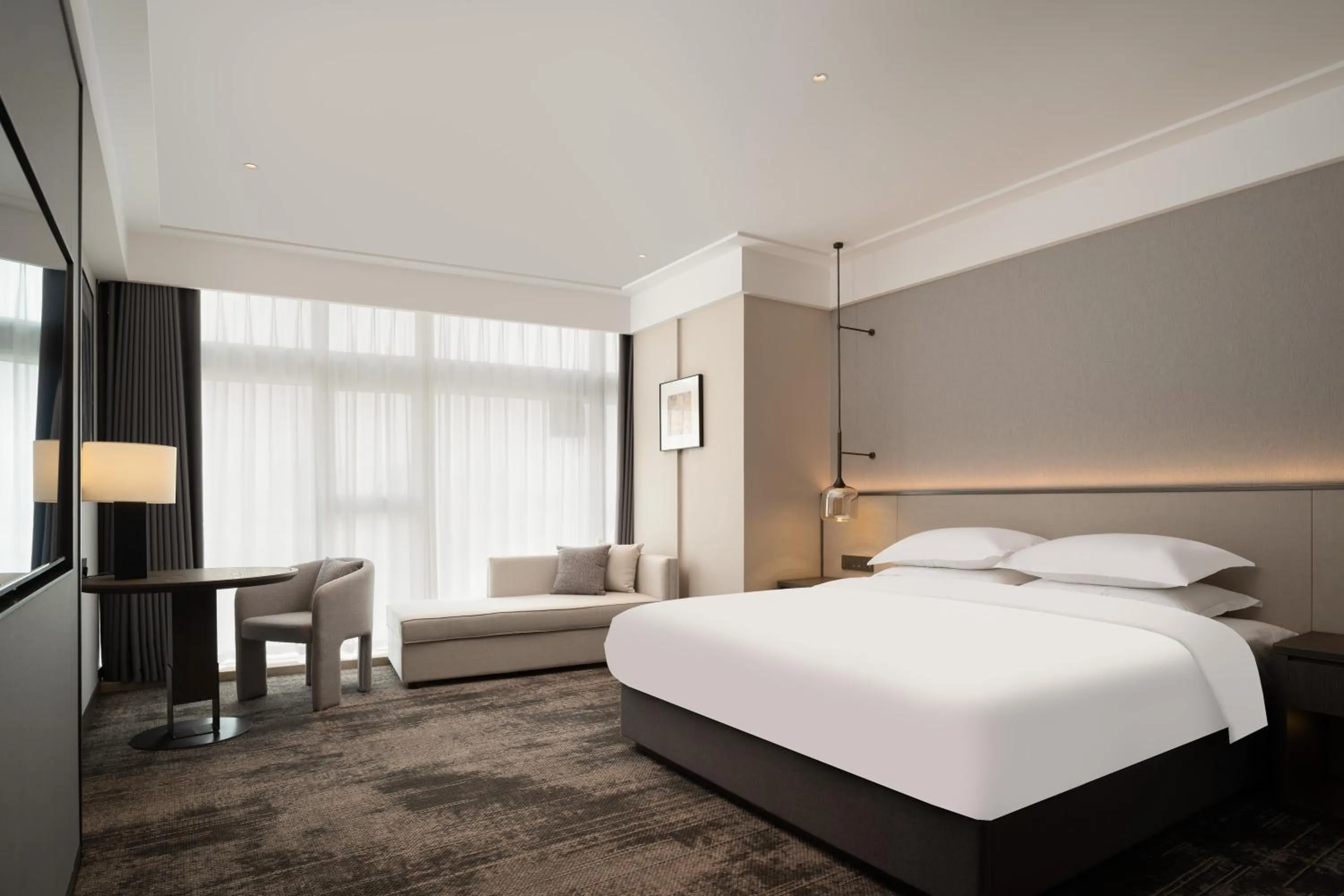 Photo of the whole room, Bed in Howard Johnson Liquor Capital Hotel Luzhou