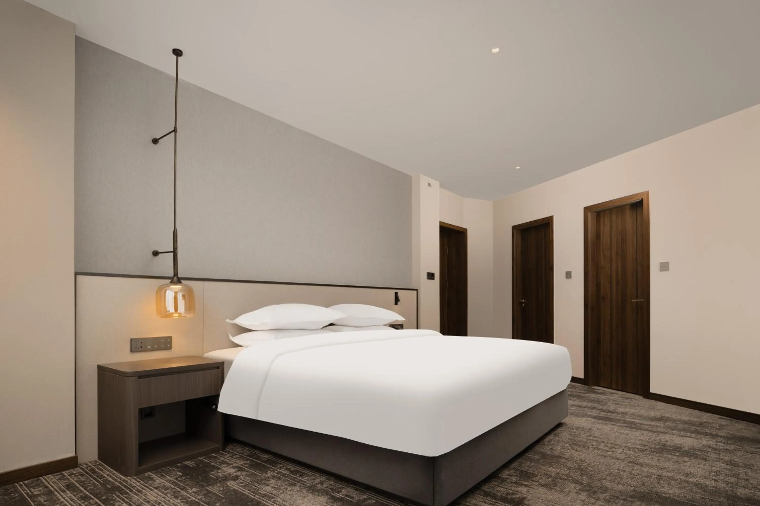 Bed in Howard Johnson Liquor Capital Hotel Luzhou