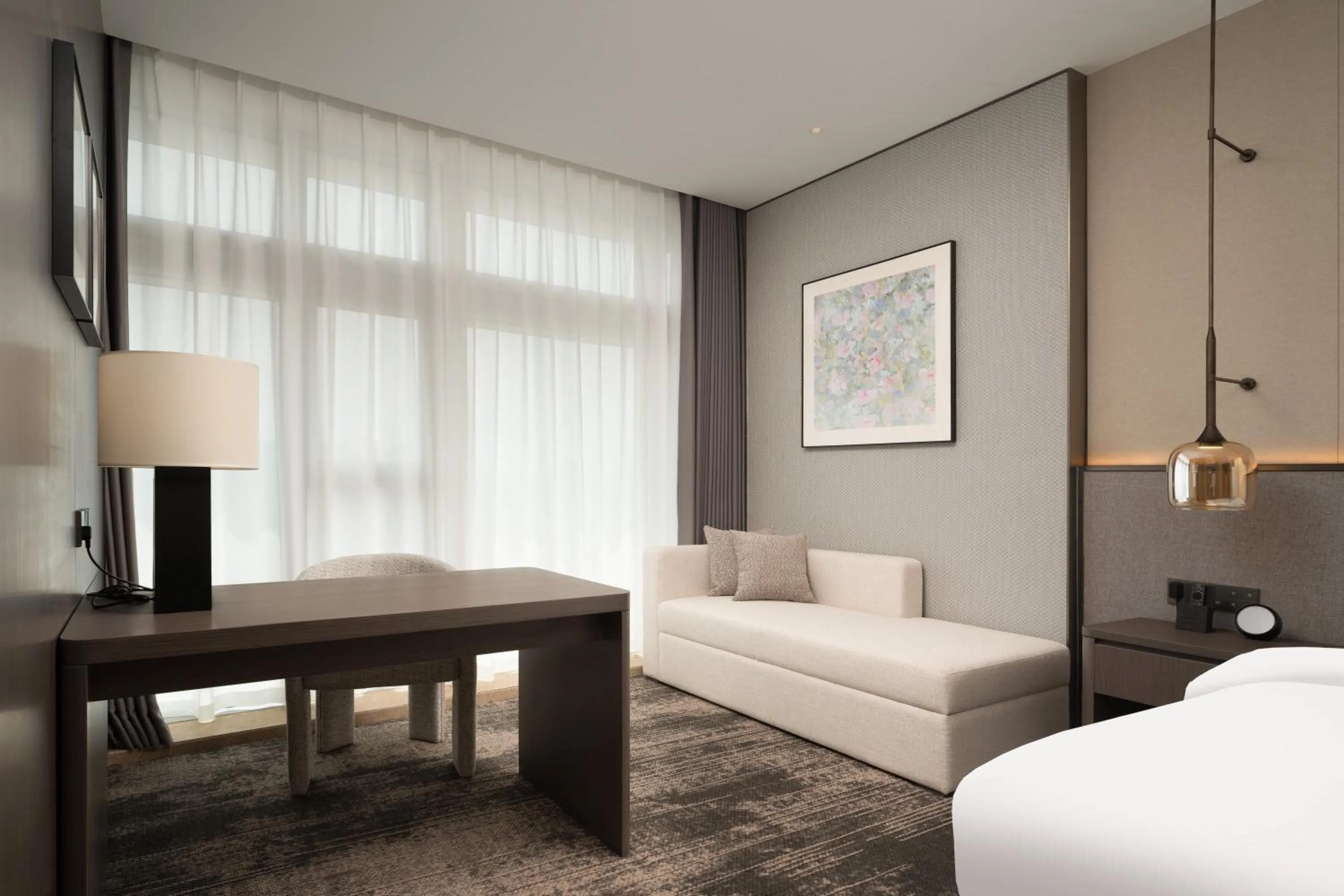 Seating area, Bed in Howard Johnson Liquor Capital Hotel Luzhou