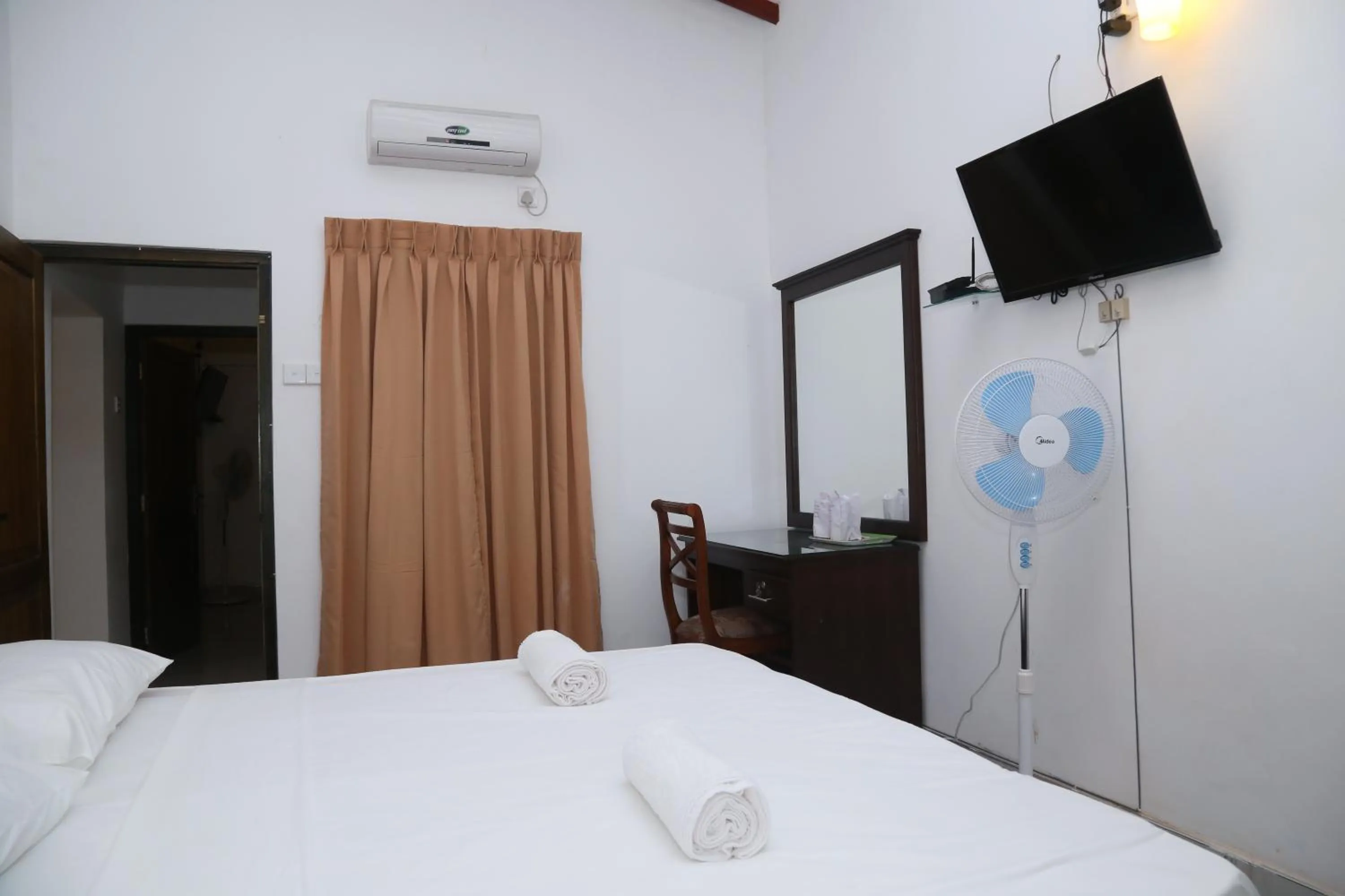 Bed in Kandy Moon Hills Hotel