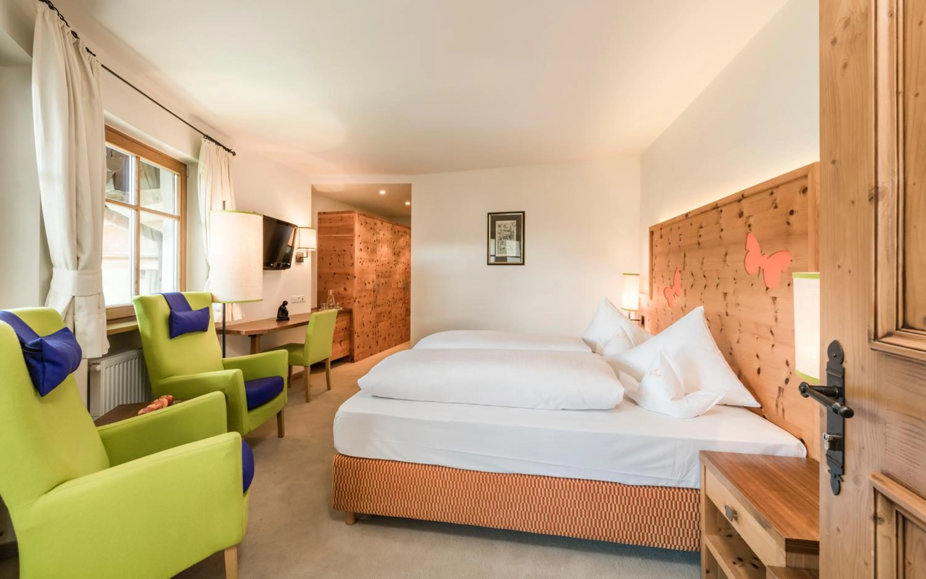 Bed in Mirabell Dolomites Hotel - Luxury Ayurveda & Spa