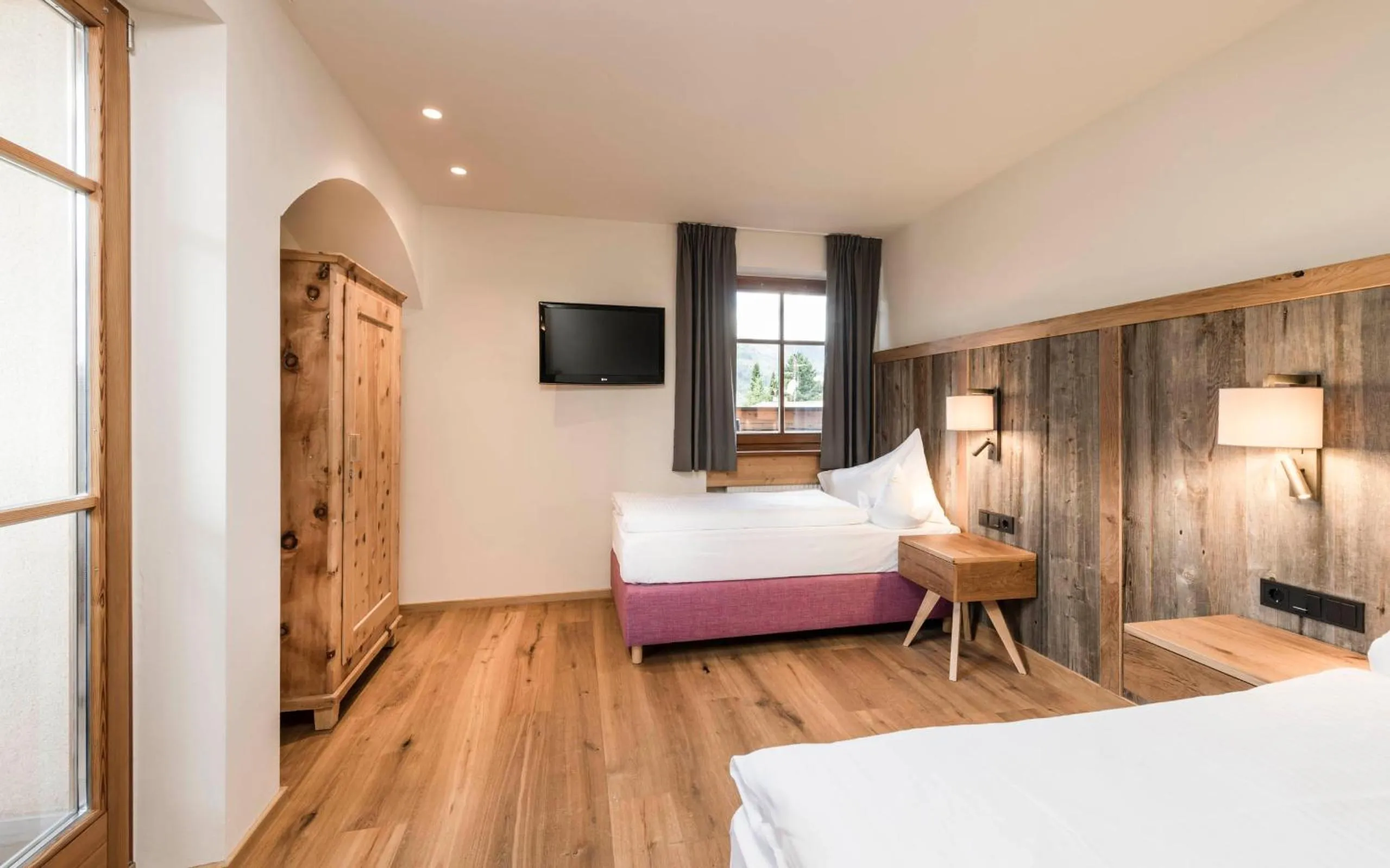 Bed in Mirabell Dolomites Hotel - Luxury Ayurveda & Spa