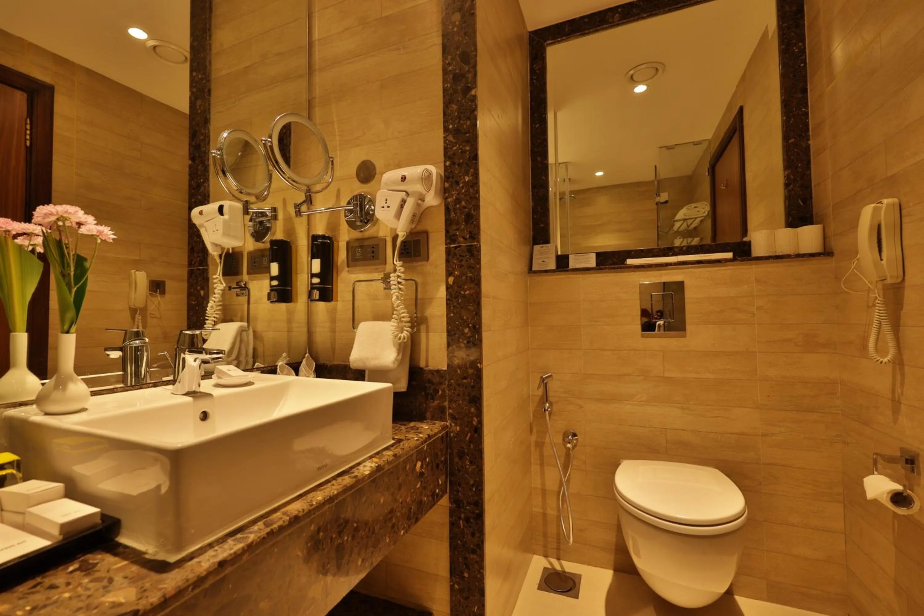 Shower in Fragrant Nature Munnar - A Five Star Classified Hotel