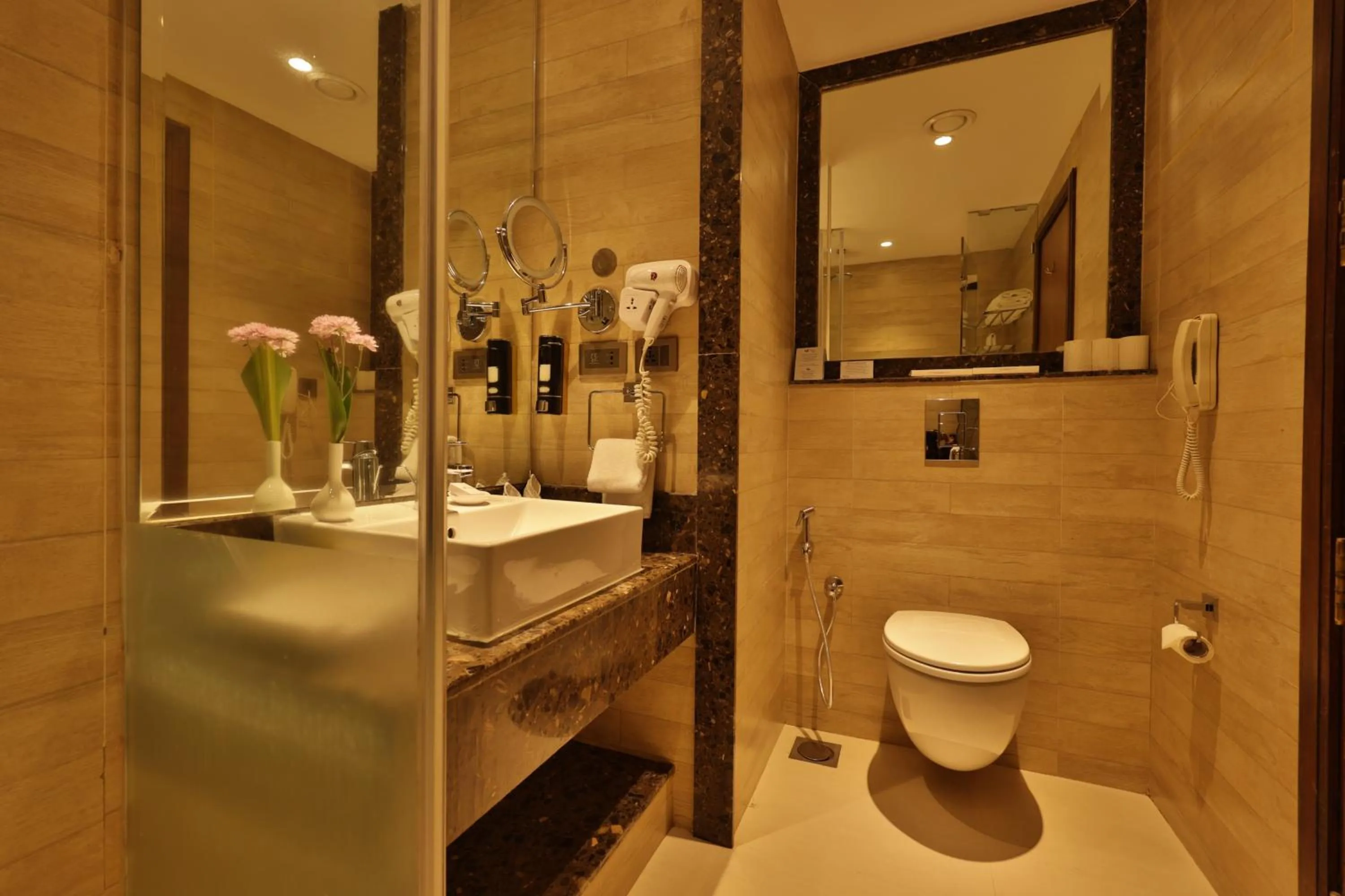 Shower in Fragrant Nature Munnar - A Five Star Classified Hotel