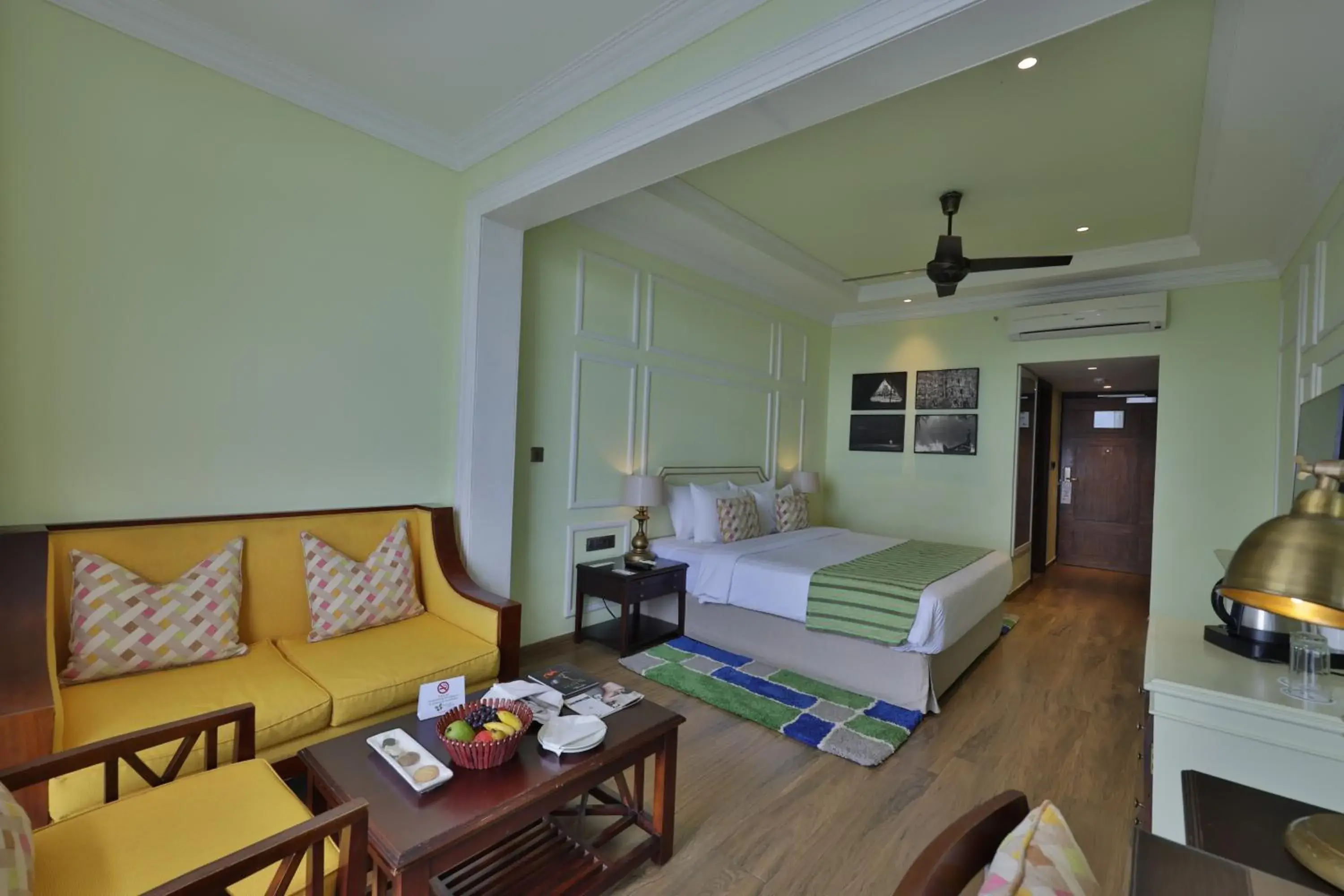 Standard Tropic Green Room with Partial Mountain View in Fragrant Nature Munnar - A Five Star Classified Hotel Standard Tropic Green Room with Partial Mountain View in Fragrant Nature Munnar - A Five Star Classified Hotel