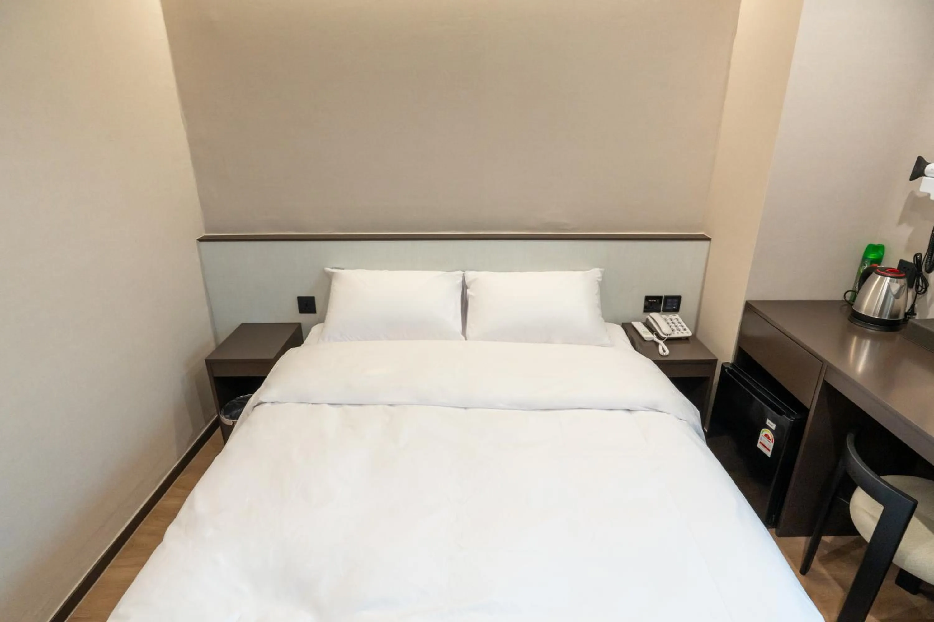 Bed in Dongdaemun Tourist Hotel