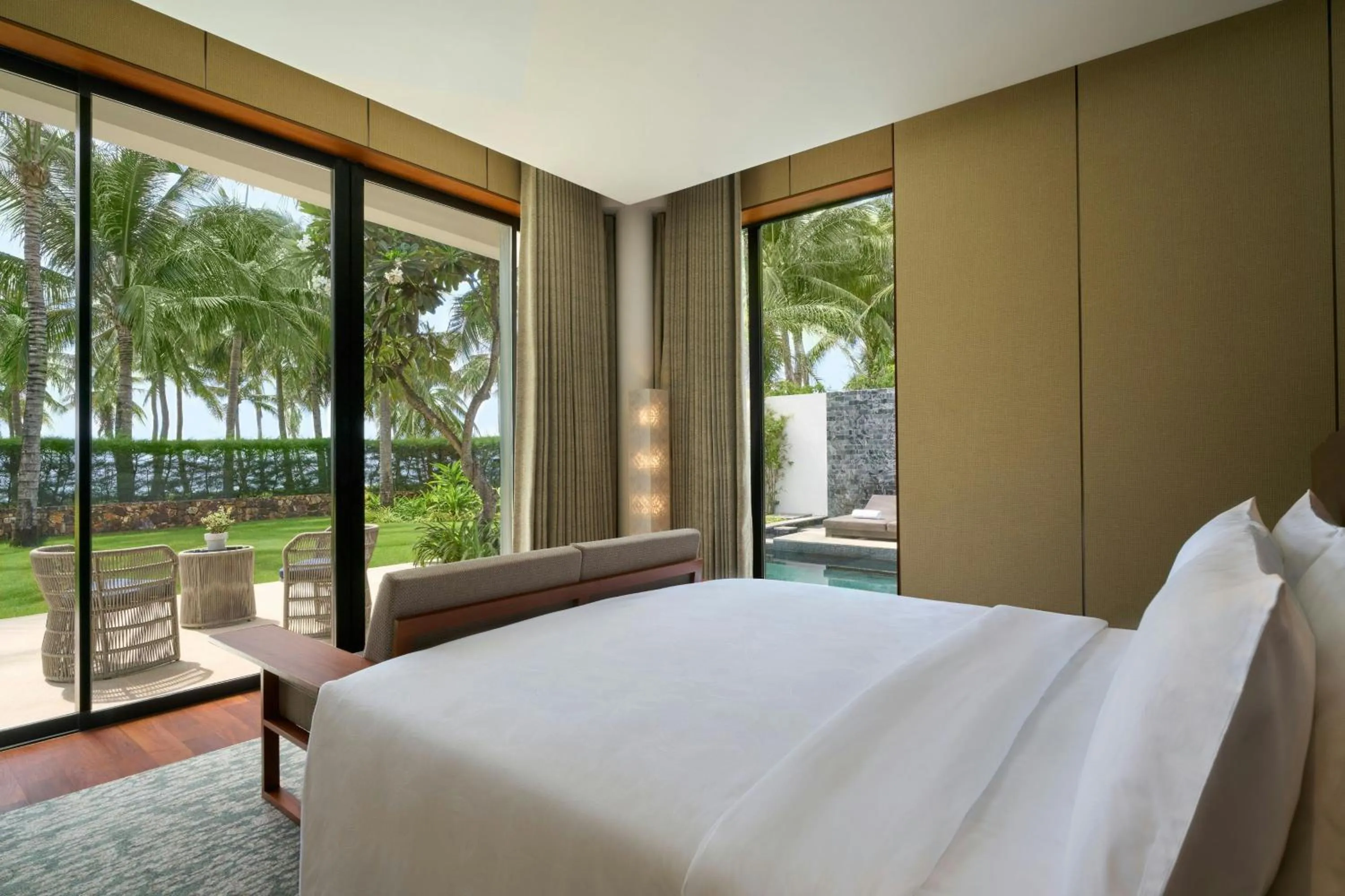 Swimming pool, Bed in JW Marriott Cam Ranh Bay Resort & Spa