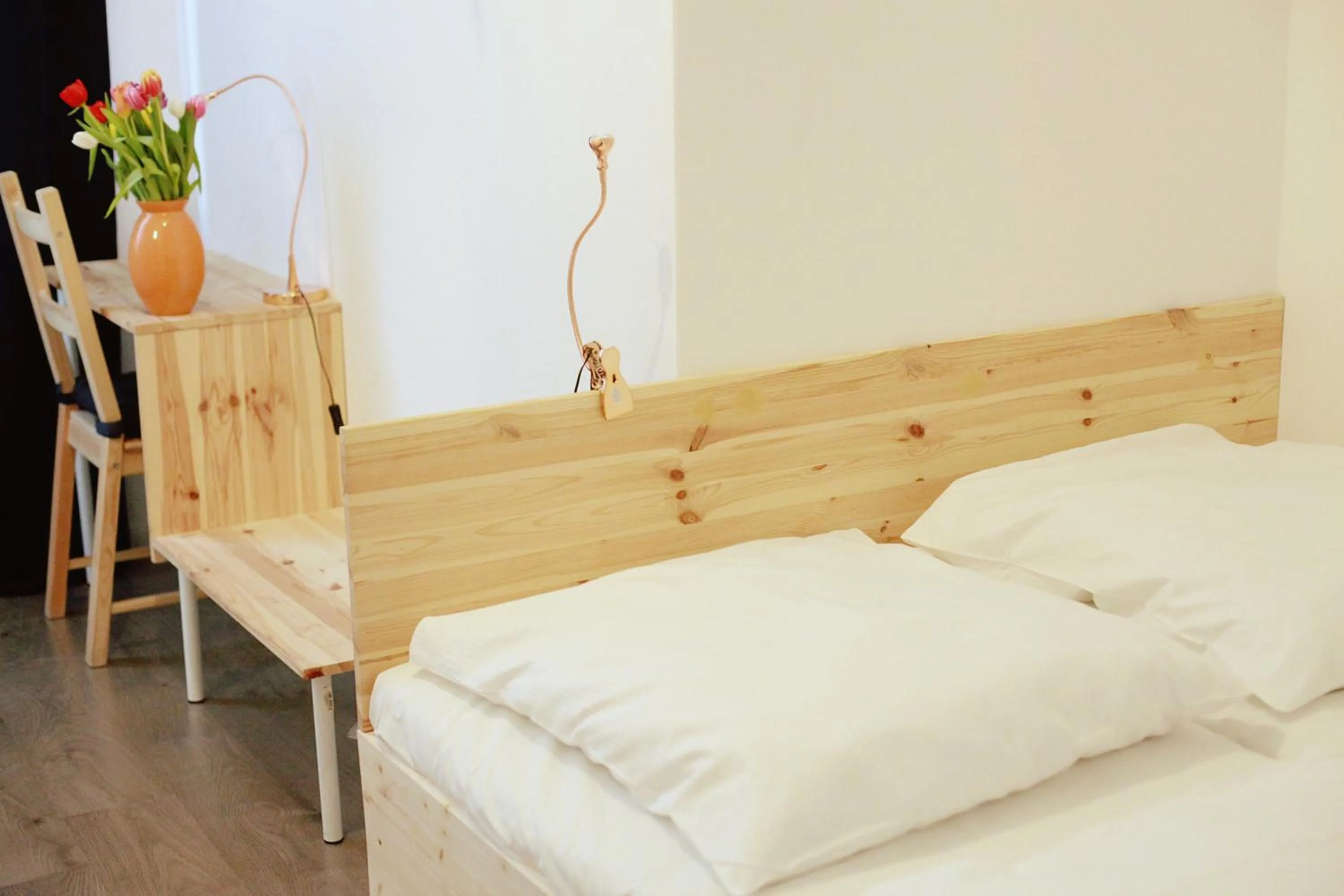 Seating area, Bed in MAC City Hostel