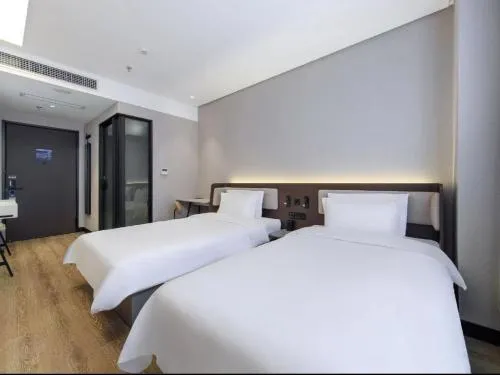 Bed in Hanting Hotel Beijing Fangshan Changyang Subway Station