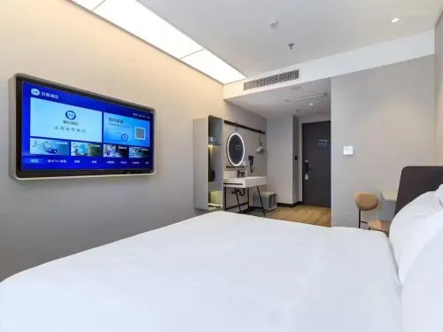 Bed in Hanting Hotel Beijing Fangshan Changyang Subway Station