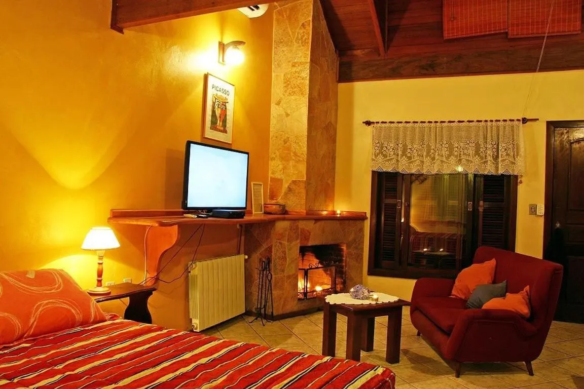 Seating area, Bed in Chalets do Vale