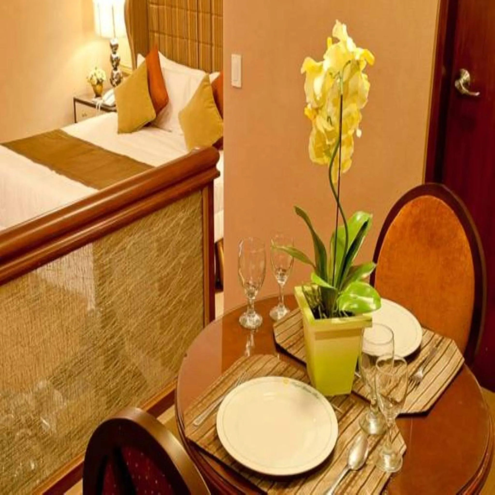 Bed in Royal Garden Hotel