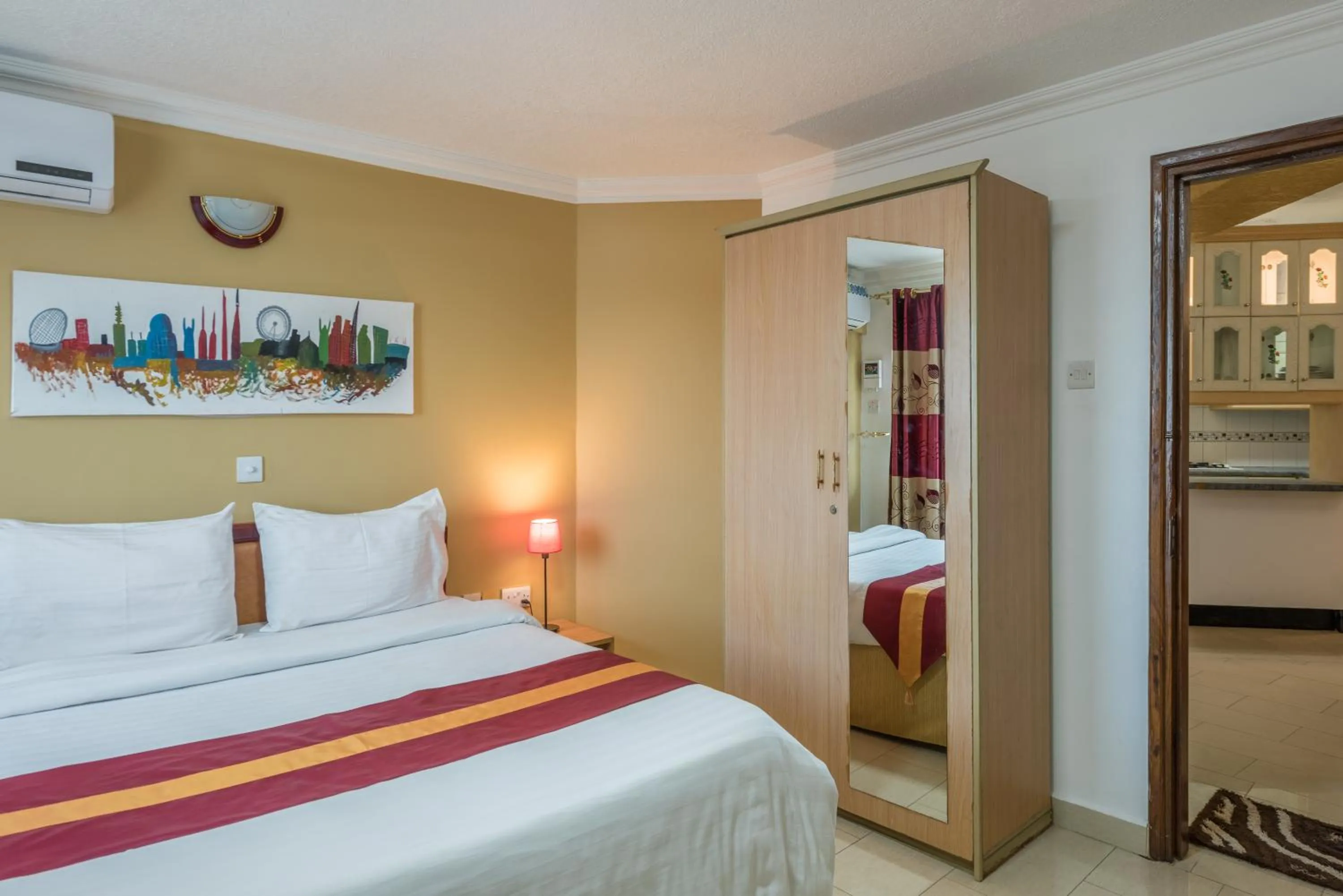 Bed in Hotel Raha Tower