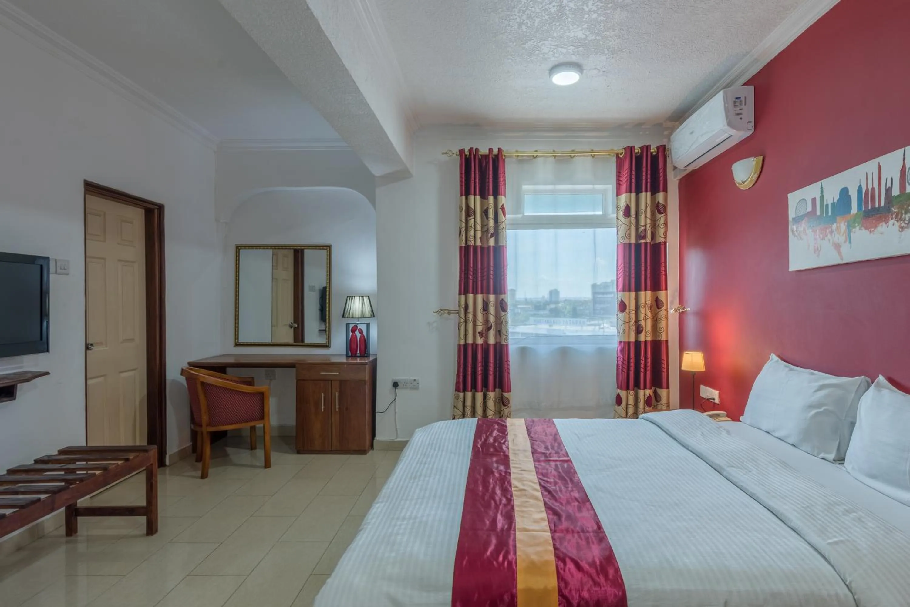 Bed in Hotel Raha Tower